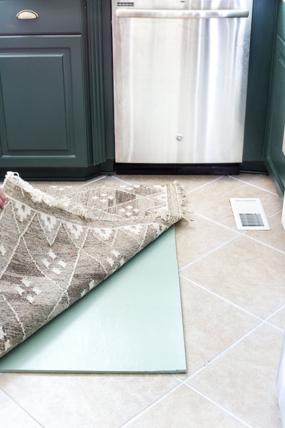 layered memory foam kitchen rug trick to add comfort on hard tile floors