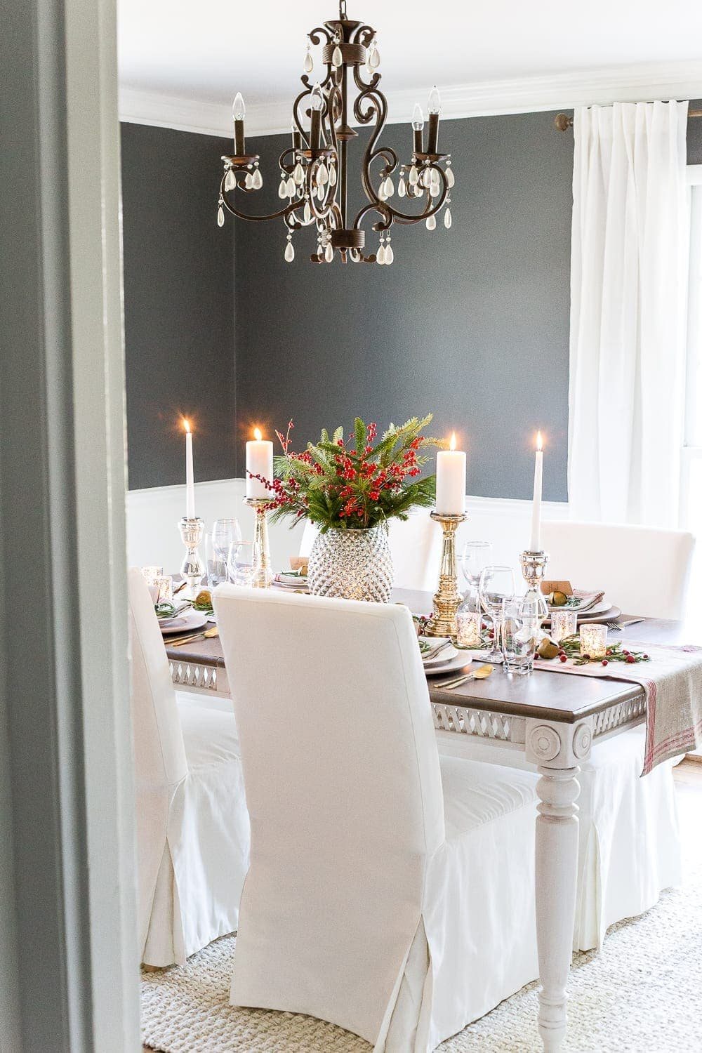Mercury Glass Christmas Tablescape | unigumushane.com - How to set up a vintage glam mercury glass Christmas tablescape with tips and sources for how to do it on a budget. #christmasdecor #christmastablescape #holidaydecor #christmasdiningroom
