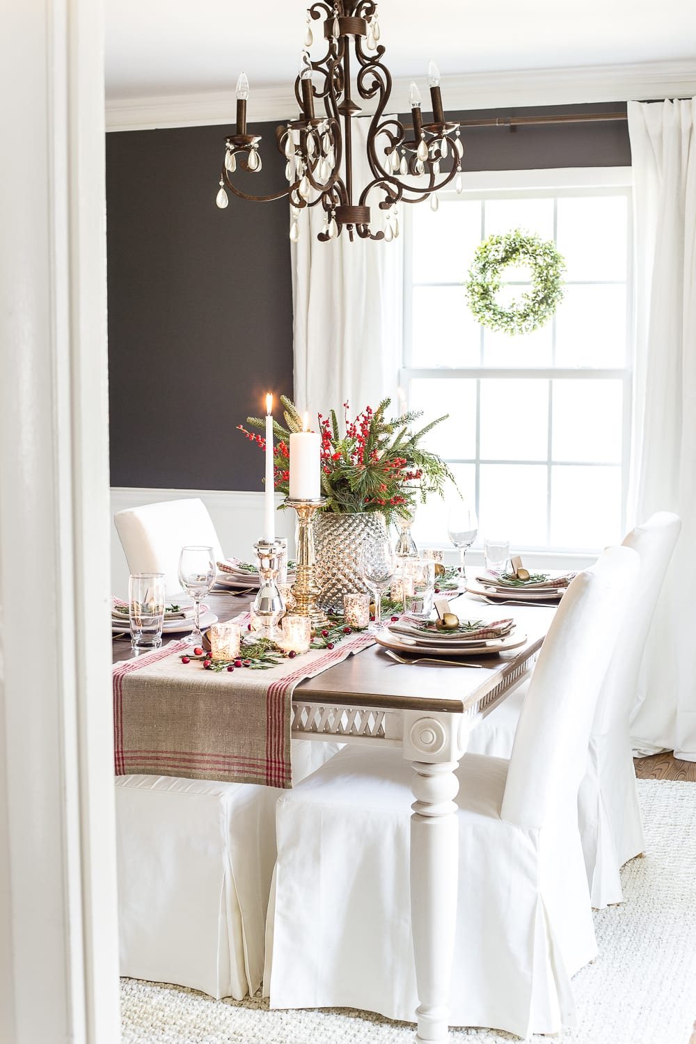 Mercury Glass Christmas Tablescape | unigumushane.com - How to set up a vintage glam mercury glass Christmas tablescape with tips and sources for how to do it on a budget. #christmasdecor #christmastablescape #holidaydecor #christmasdiningroom