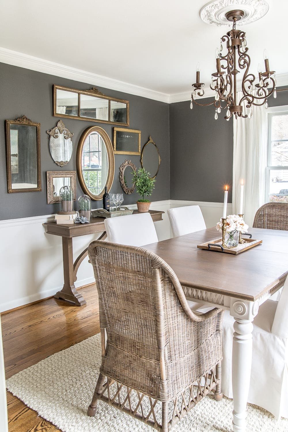 A couple of tricks for hanging the perfect mirror gallery wall plus ideas for a traditional meets modern eclectic dining room. #diningroom #gallerywall #walldecor #mirrors
