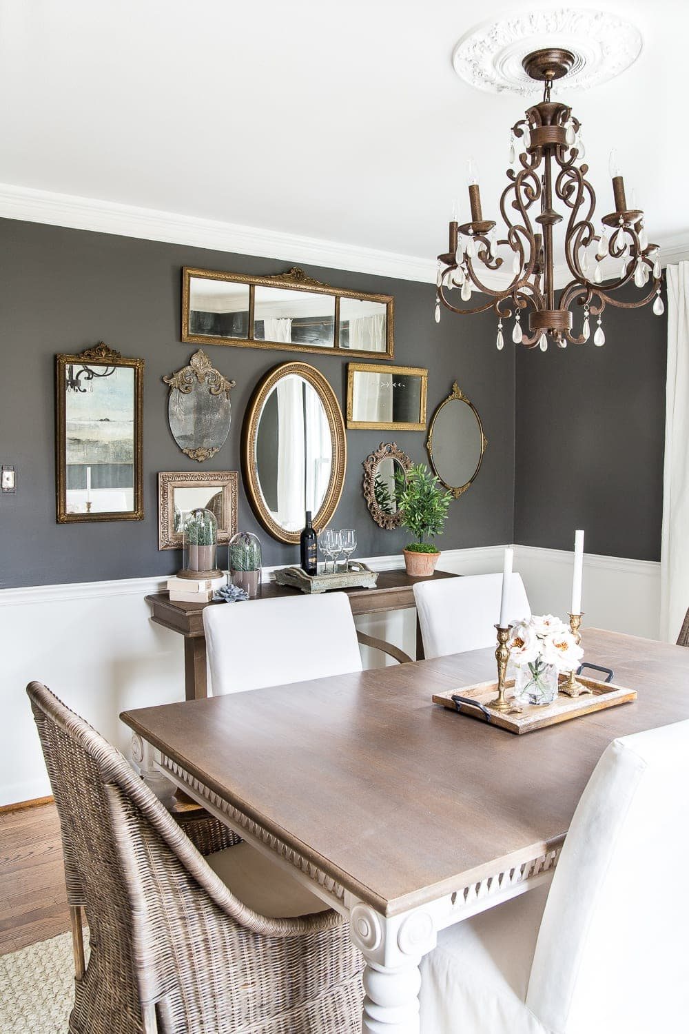 A couple of tricks for hanging the perfect mirror gallery wall plus ideas for a traditional meets modern eclectic dining room. #diningroom #gallerywall #walldecor #mirrors