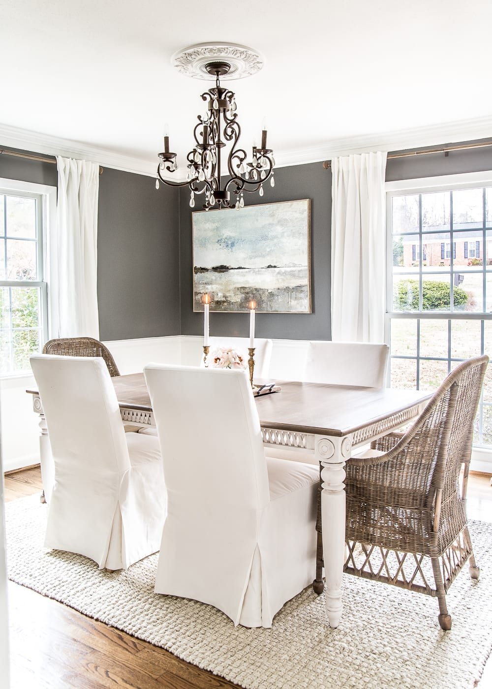 A couple of tricks for hanging the perfect mirror gallery wall plus ideas for a traditional meets modern eclectic dining room. #diningroom #gallerywall #walldecor #mirrors