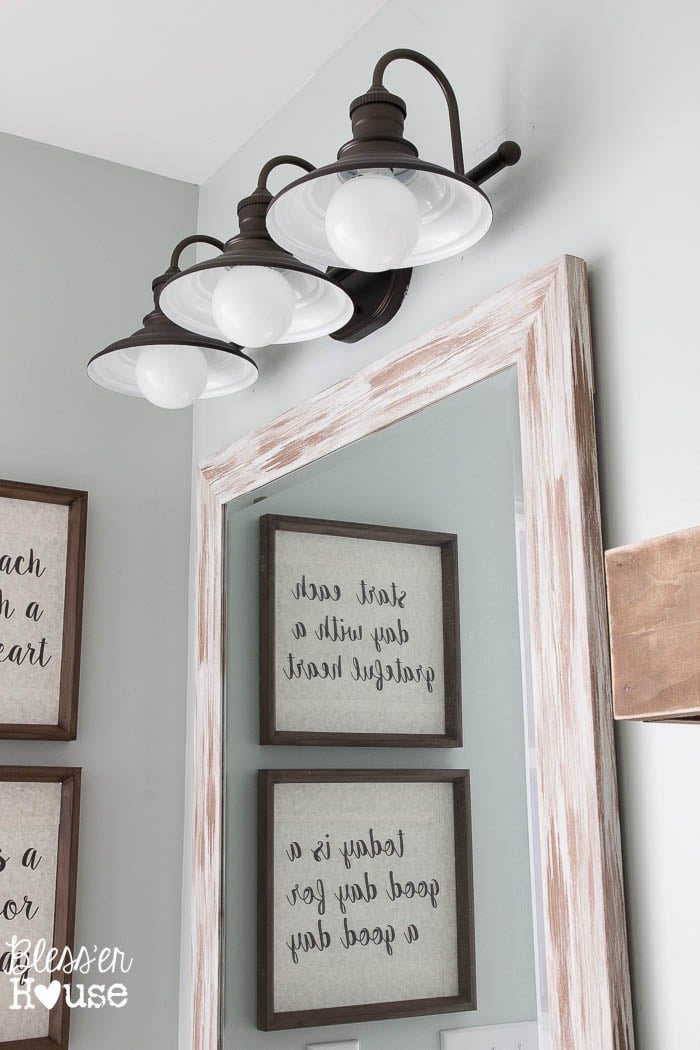 Modern Farmhouse Bathroom Makeover | Unigumushane - So many great ideas to create charm in a builder grade bathroom!