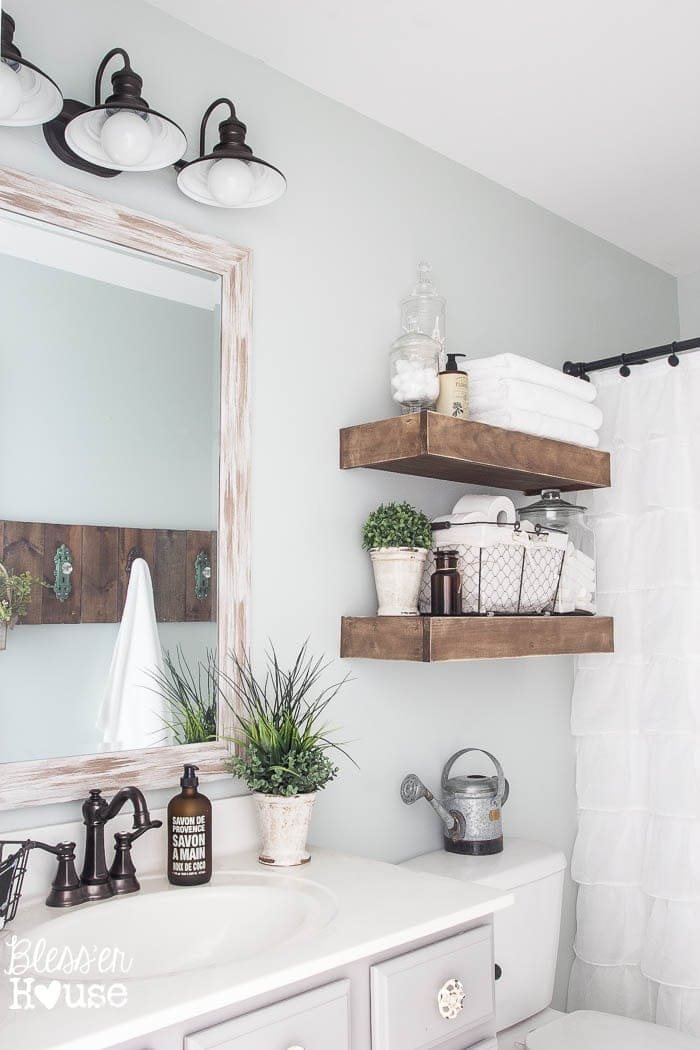 Modern Farmhouse Bathroom Makeover | Unigumushane - So many great ideas to create charm in a builder grade bathroom!