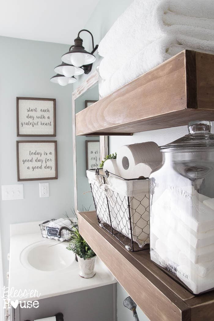 Modern Farmhouse Bathroom Makeover | Unigumushane - So many great ideas to create charm in a builder grade bathroom!