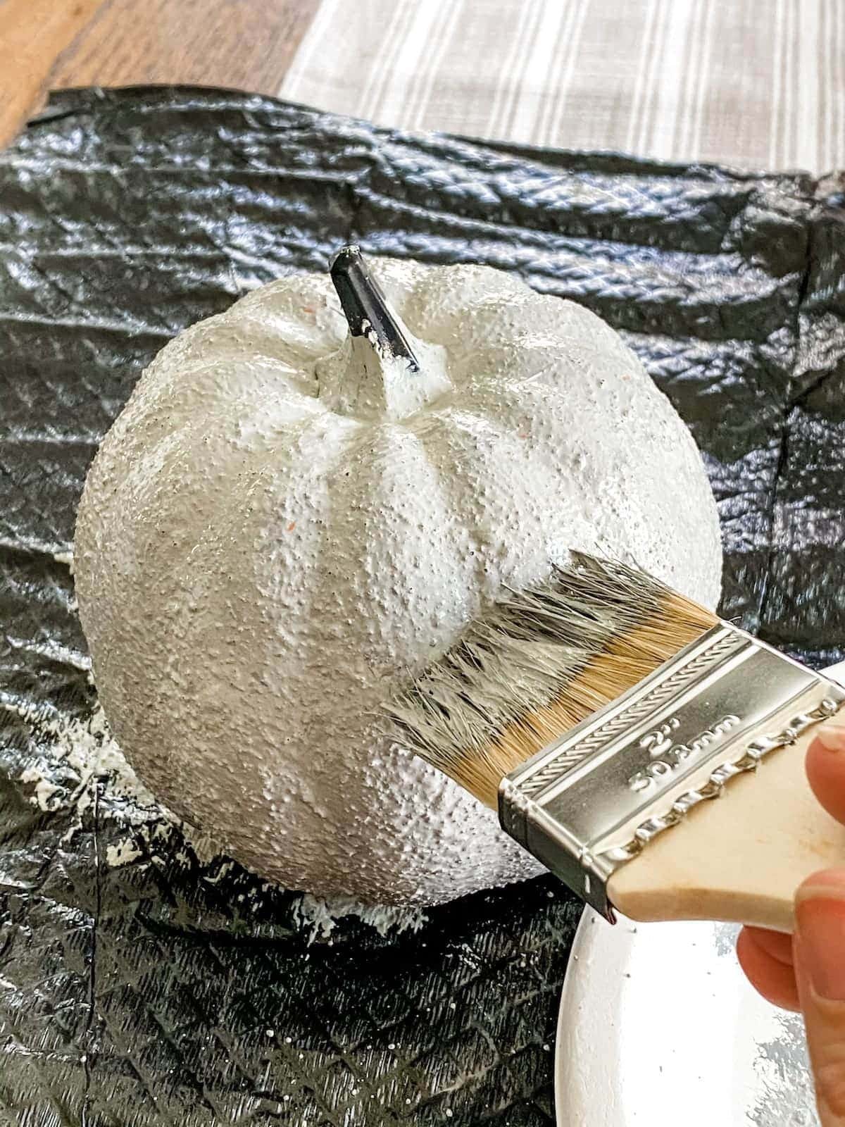 fake pumpkin with concrete paint