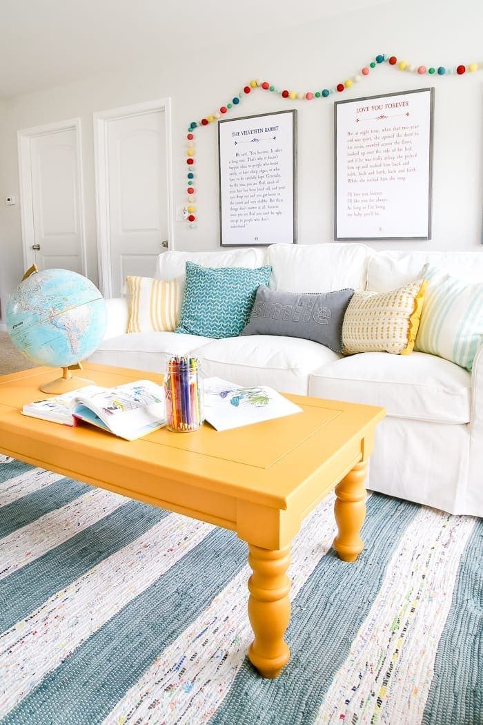 Mustard Playroom Coffee Table Makeover | unigumushane.com - An old thrifted wooden coffee table gets a bright and cheerful makeover using Fusion Mineral Paint in Mustard for a fun addition to a playroom.