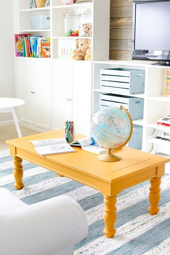 Mustard Playroom Coffee Table Makeover | unigumushane.com - An old thrifted wooden coffee table gets a bright and cheerful makeover using Fusion Mineral Paint in Mustard for a fun addition to a playroom.