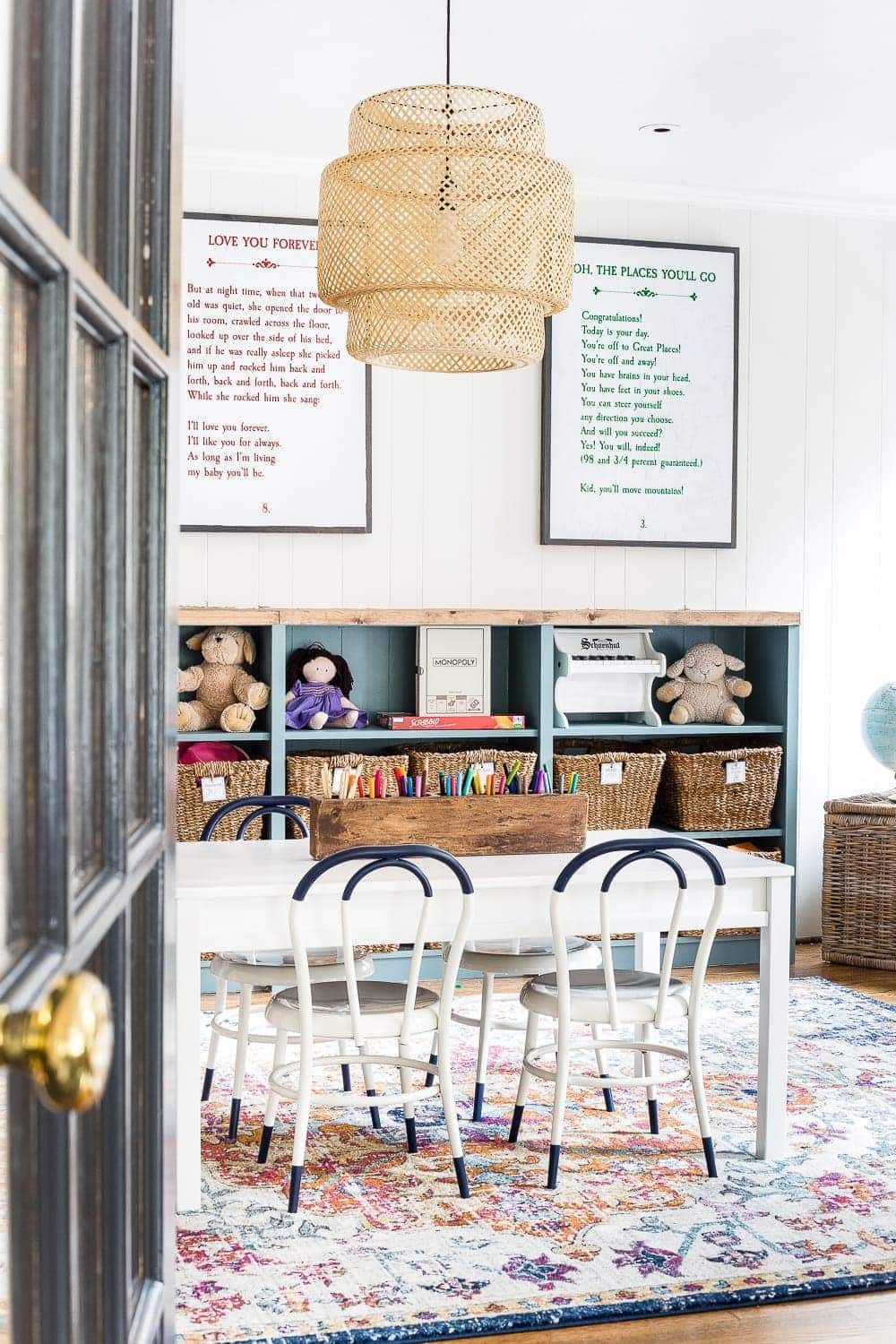 A playroom makeover with bamboo light fixture, adjustable play table, and miniature French bistro chairs. #playroom #kidsdecor