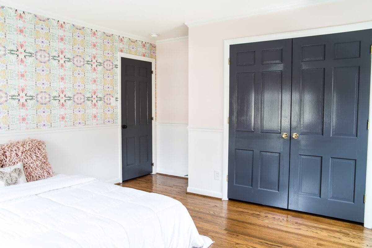 A sweet pastel little girl bedroom makeover with Behr My Sweetheart and retro wallpaper to transition into pre-teen/teenage years. #girlbedroom #kidsdecor #wallpaper #pinkpaint