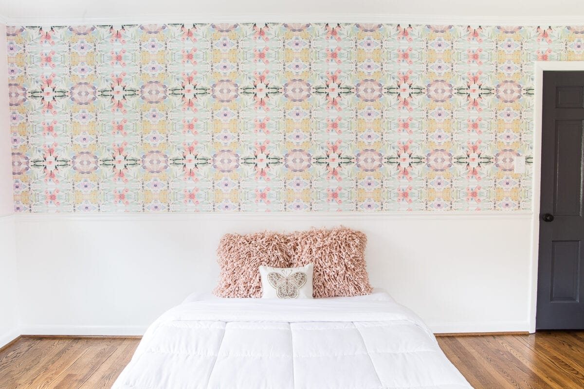 A sweet pastel little girl bedroom makeover with Behr My Sweetheart and retro wallpaper to transition into pre-teen/teenage years. #girlbedroom #kidsdecor #wallpaper #pinkpaint