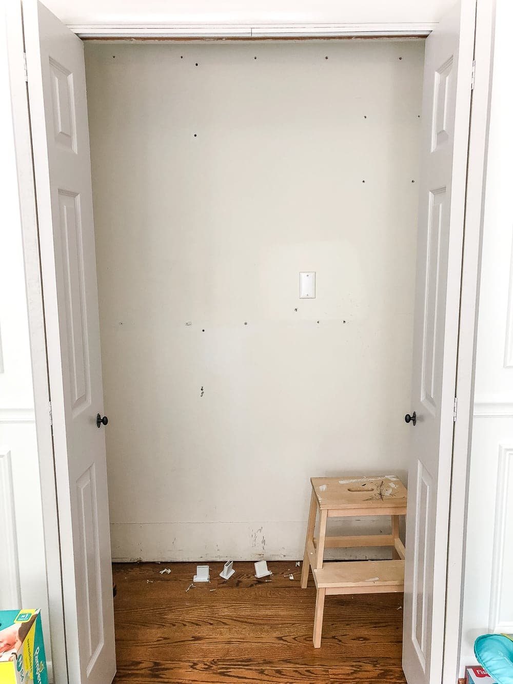 Nursery closet with wire shelving removed