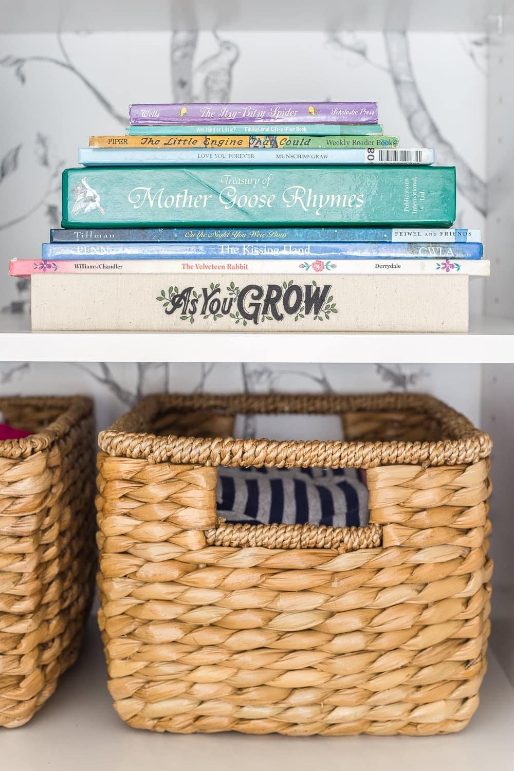 Nursery Organization | Closet shelves to hold next phase size clothing and baby books for story time.