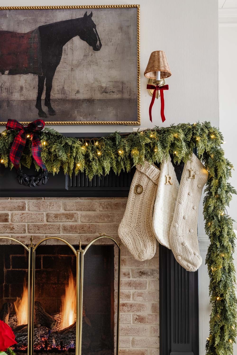 Ralph Lauren Christmas decorating ideas on a budget - navy blue mantel with garland