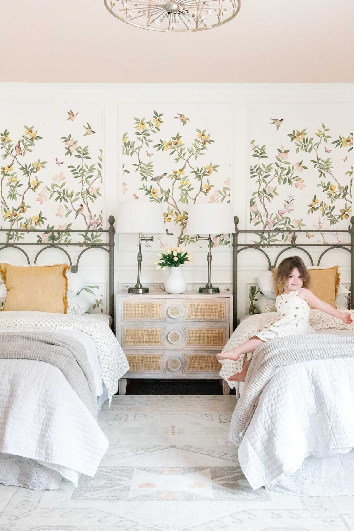 toddler girl bedroom with twin beds and cottagecore style pattern play