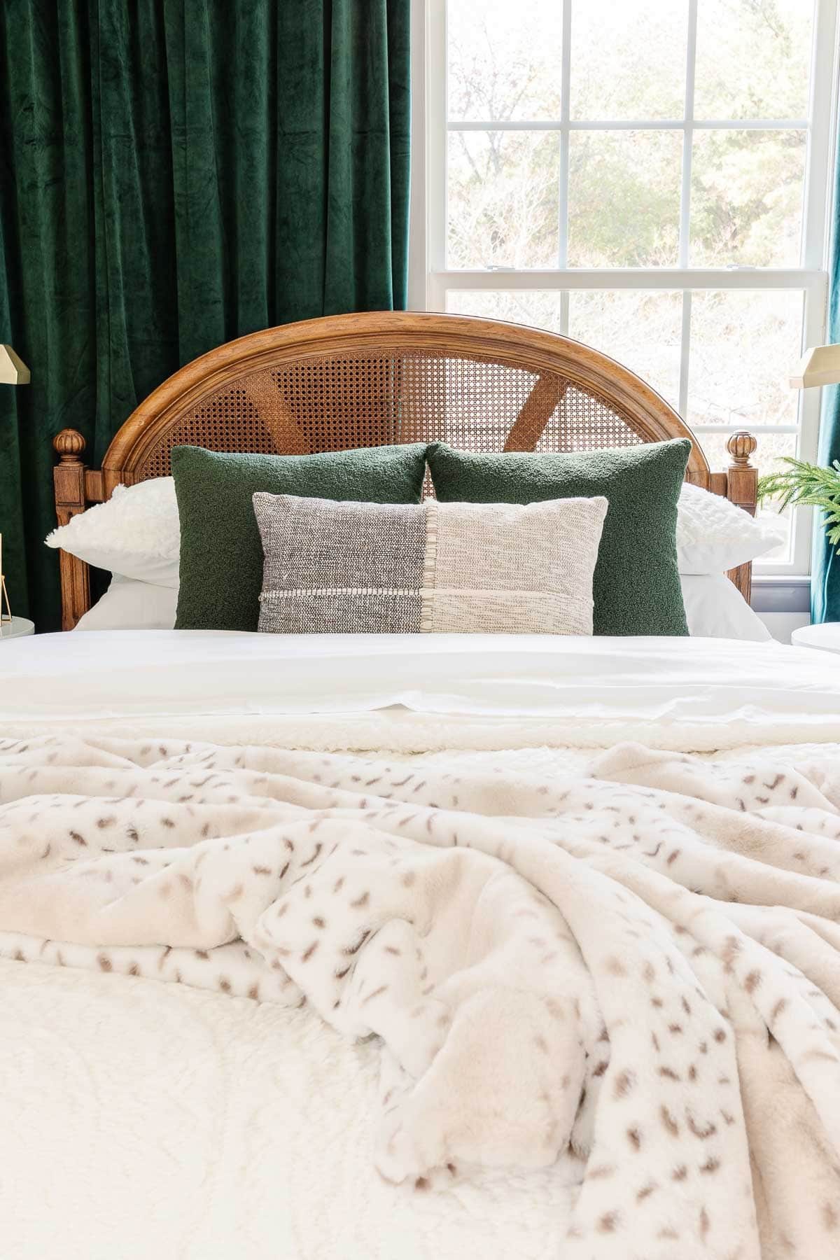 faux fur throw blanket and green sherpa pillows