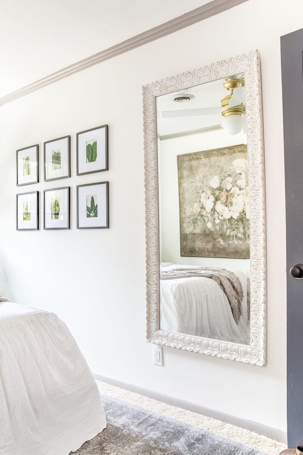 A boring guest bedroom gets a luxe, vintage chic makeover using thrifty projects, budget finds, and simple decorating tricks to maximize style and space. #guestbedroom #bedroominspiration #bedroomdecor