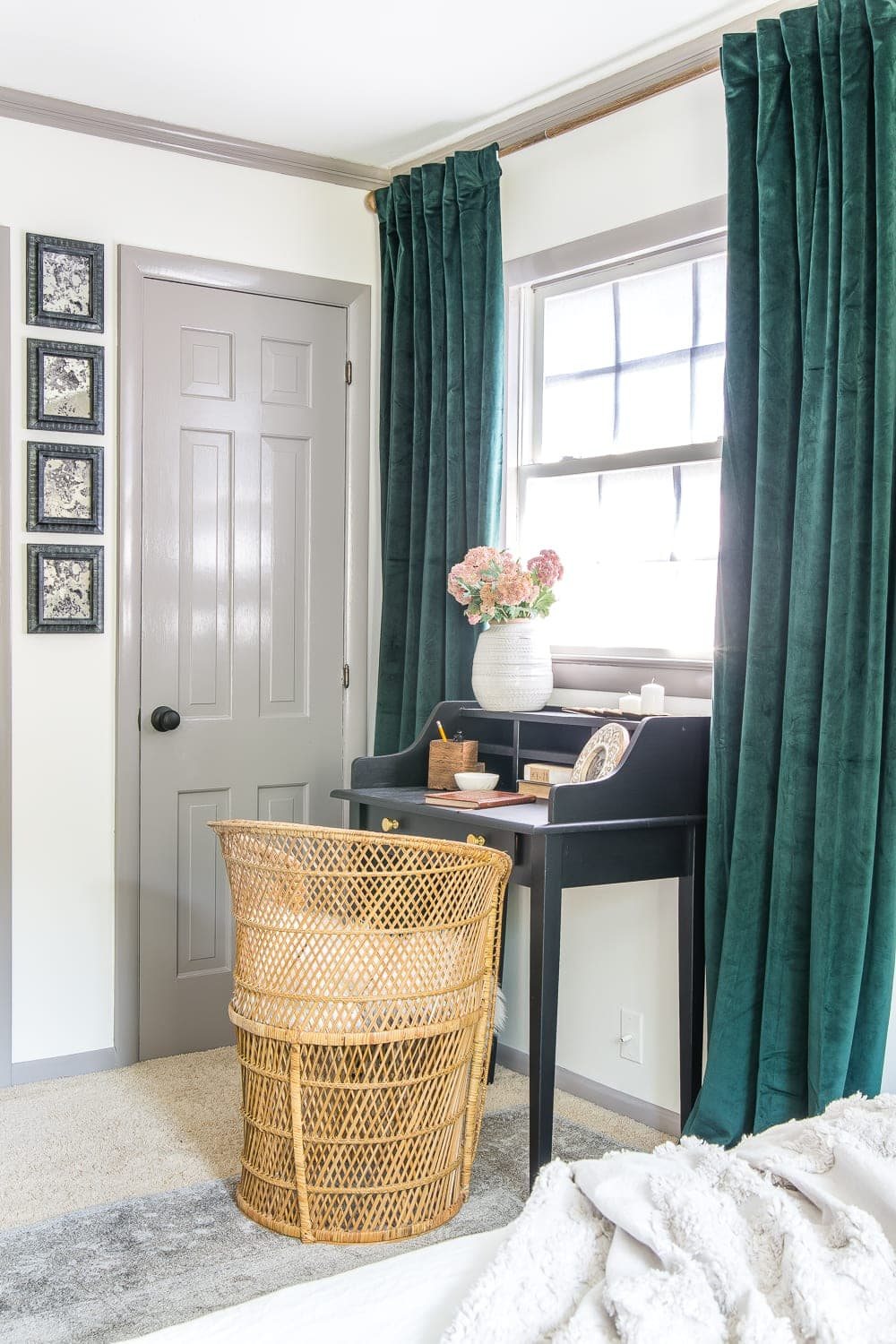 A boring guest bedroom gets a luxe, vintage chic makeover using thrifty projects, budget finds, and simple decorating tricks to maximize style and space. #guestbedroom #bedroominspiration #bedroomdecor
