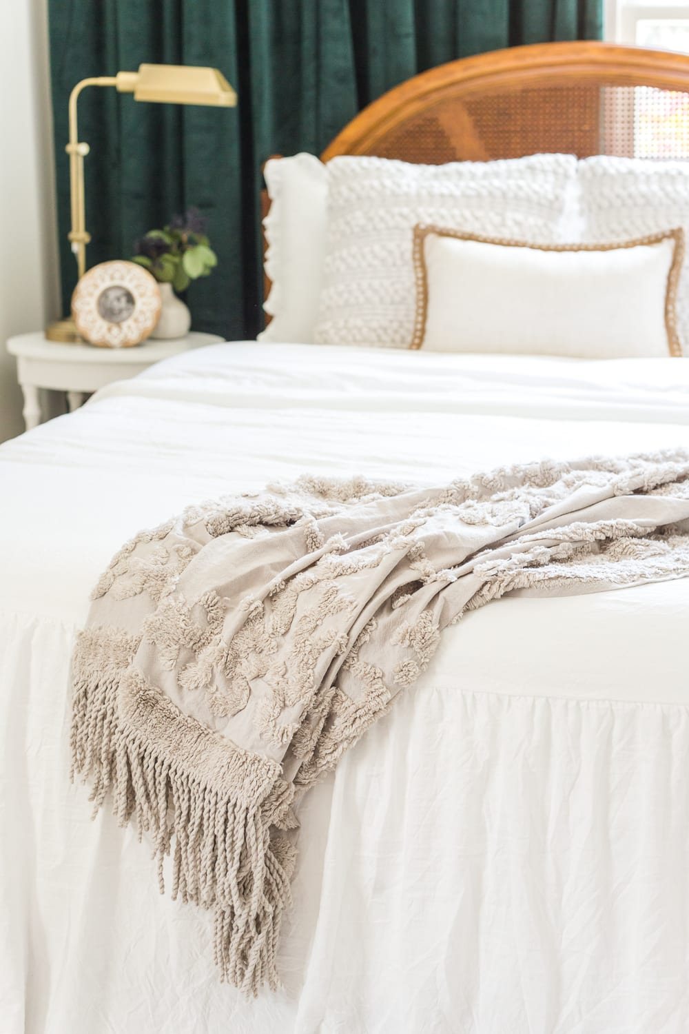 A boring guest bedroom gets a luxe, vintage chic makeover using thrifty projects, budget finds, and simple decorating tricks to maximize style and space. #guestbedroom #bedroominspiration #bedroomdecor