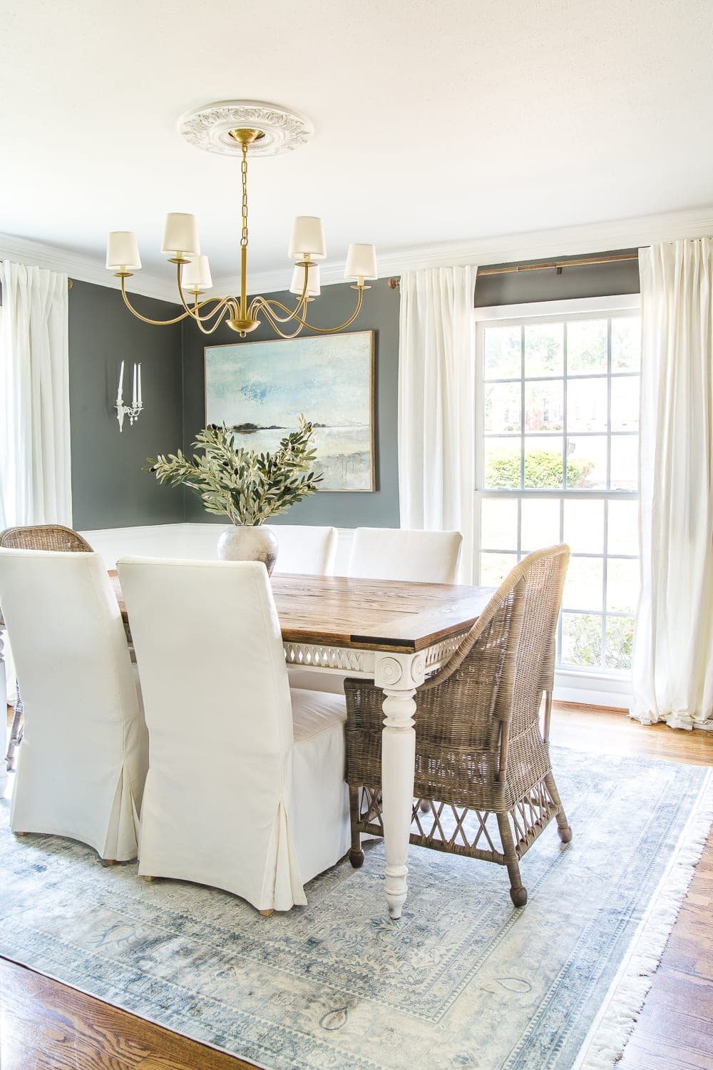 dining room with kendall charcoal walls and slipcovered dining chairs