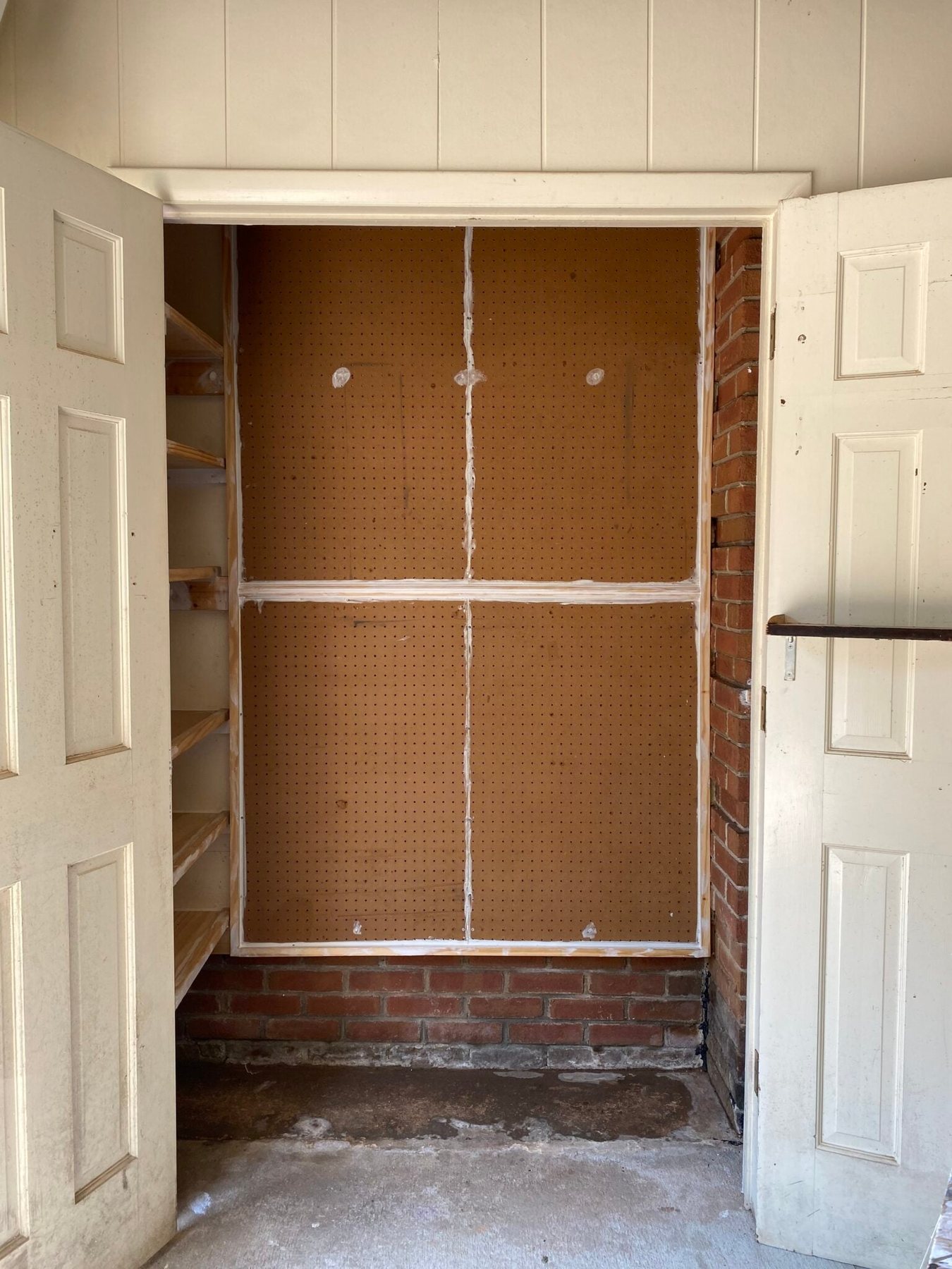 paint storage closet before