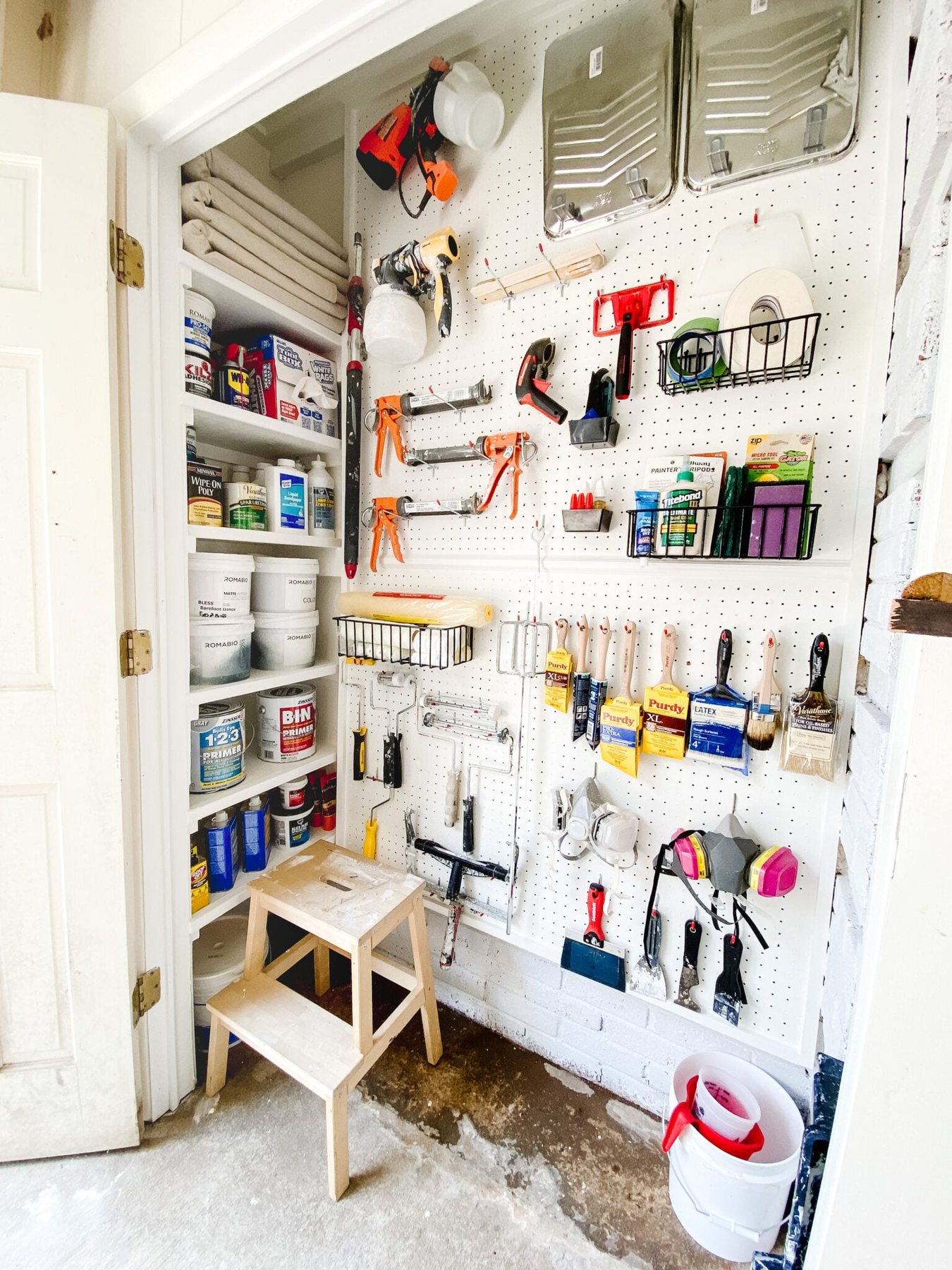 organized paint storage closet