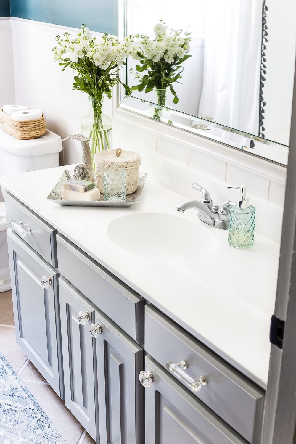How to paint a sink, countertop, tub, and shower for $100 and how to make it last using Rustoleum Tub & Tile Refinishing Kit #bathroom #bathroommakeover #diyproject #homeimprovement #paintedsink #paintedcountertop #paintedtub #paintedshower