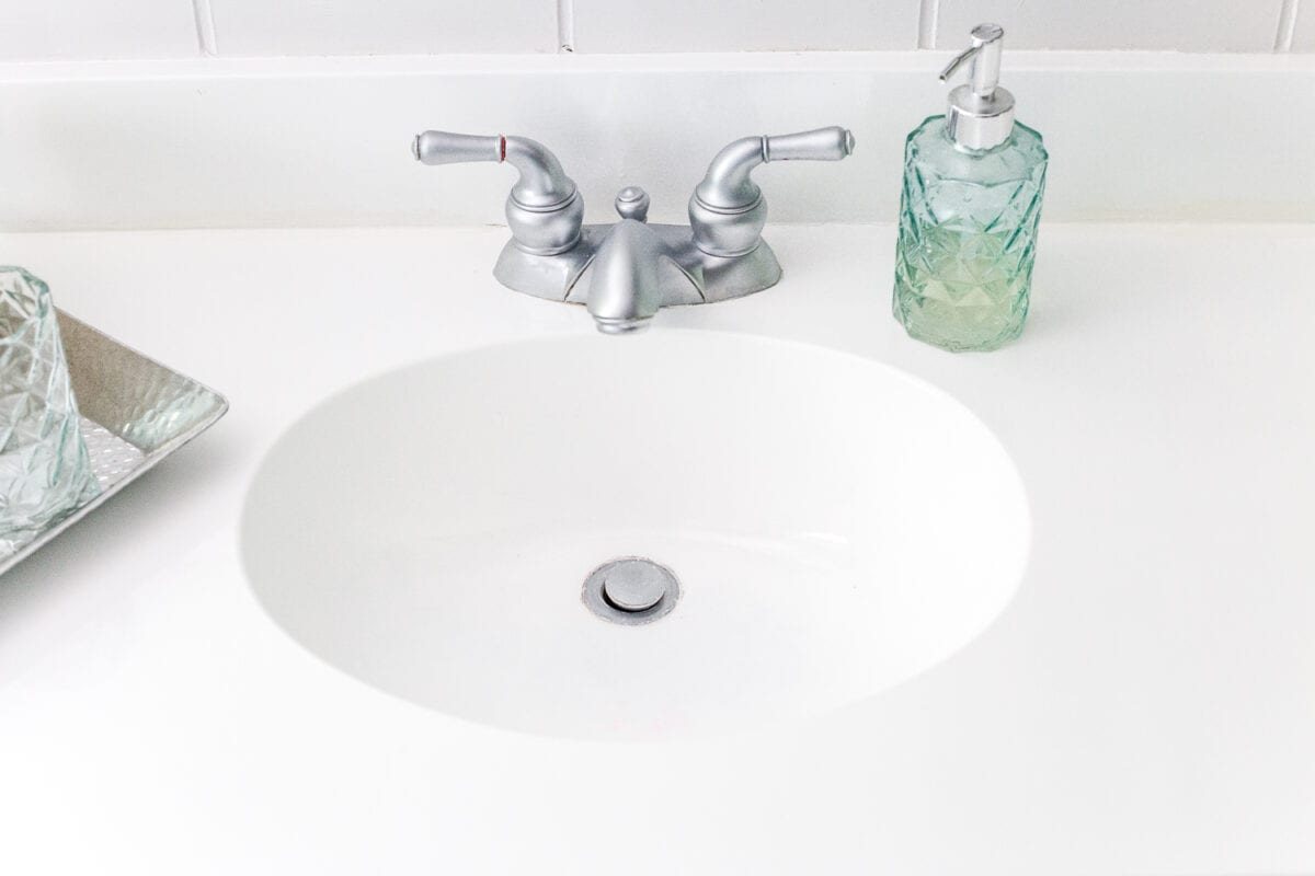 How to paint a sink, countertop, tub, and shower for $100 and how to make it last using Rustoleum Tub & Tile Refinishing Kit #bathroom #bathroommakeover #diyproject #homeimprovement #paintedsink #paintedcountertop #paintedtub #paintedshower