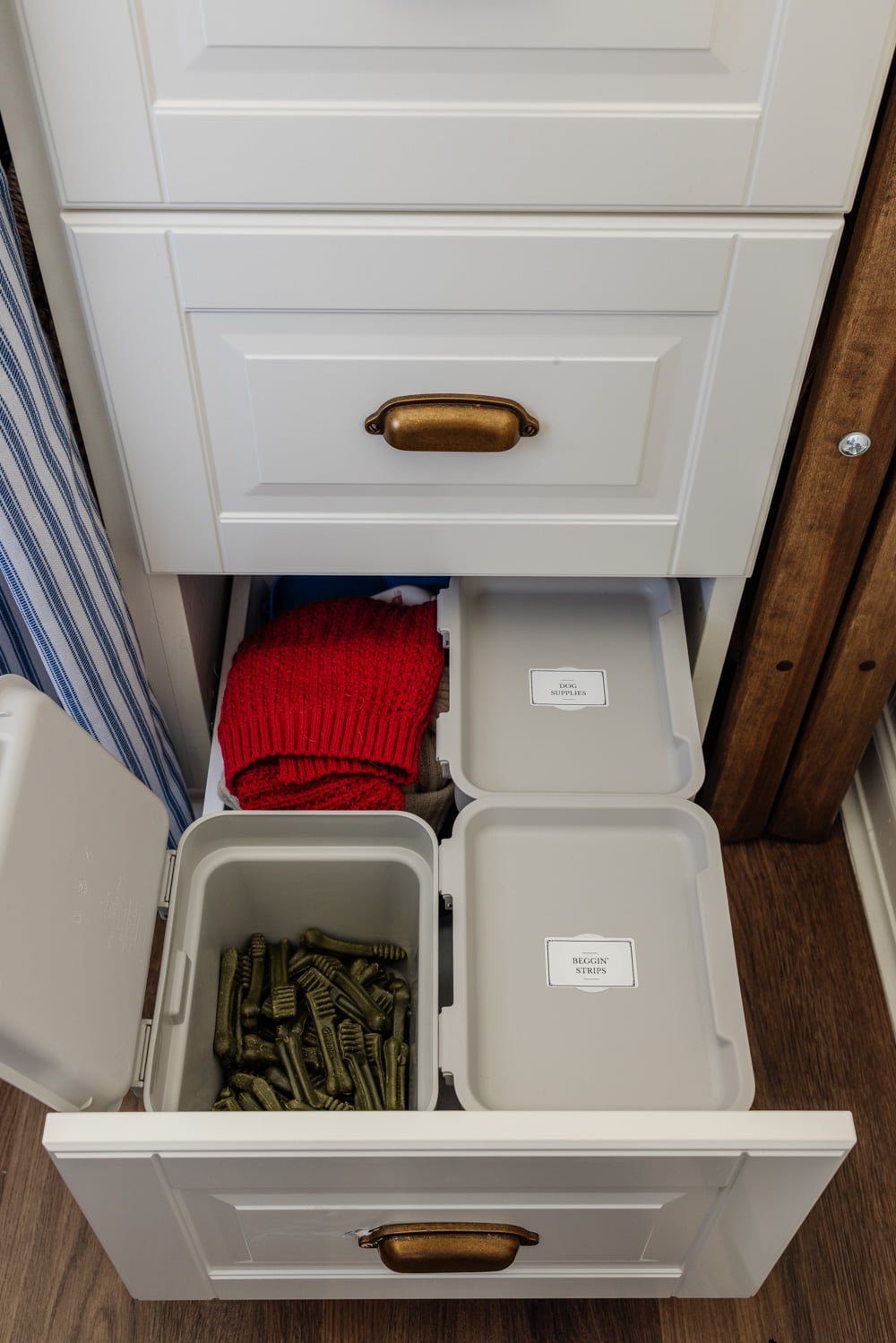 small laundry room organization - pet supplies drawer