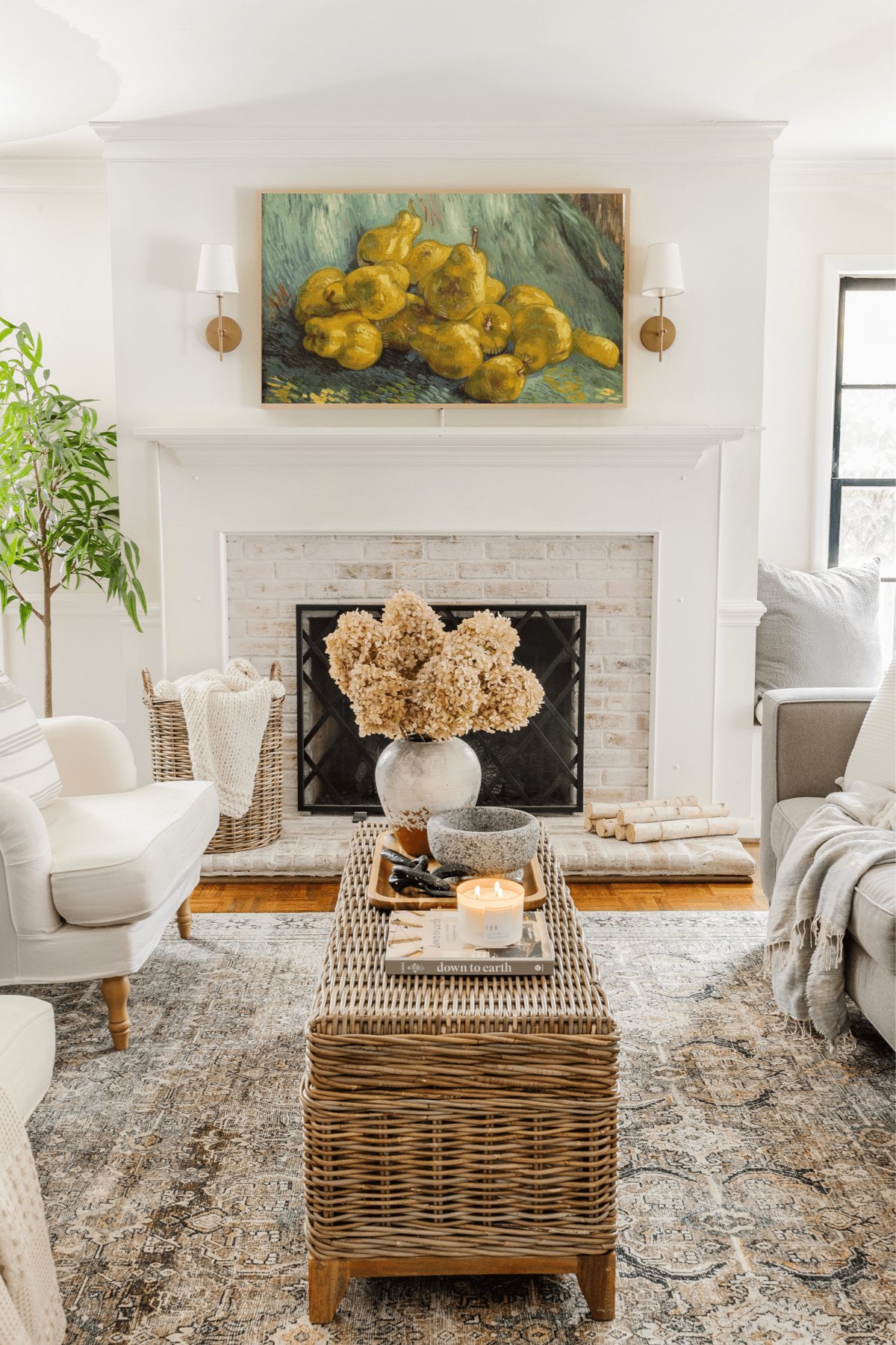 Samsung Frame TV in living room with still life art