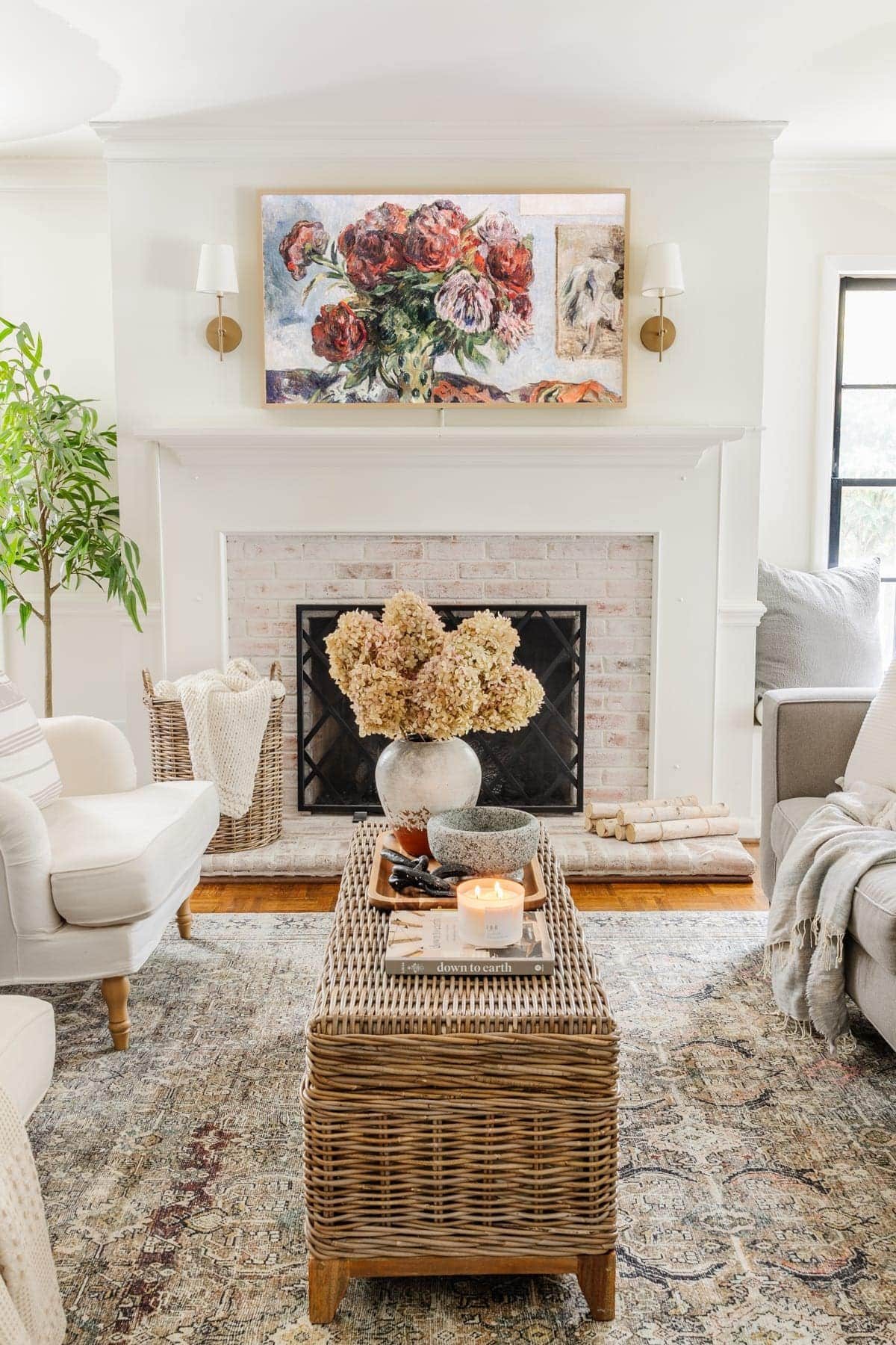 Samsung Frame TV in living room with still life art