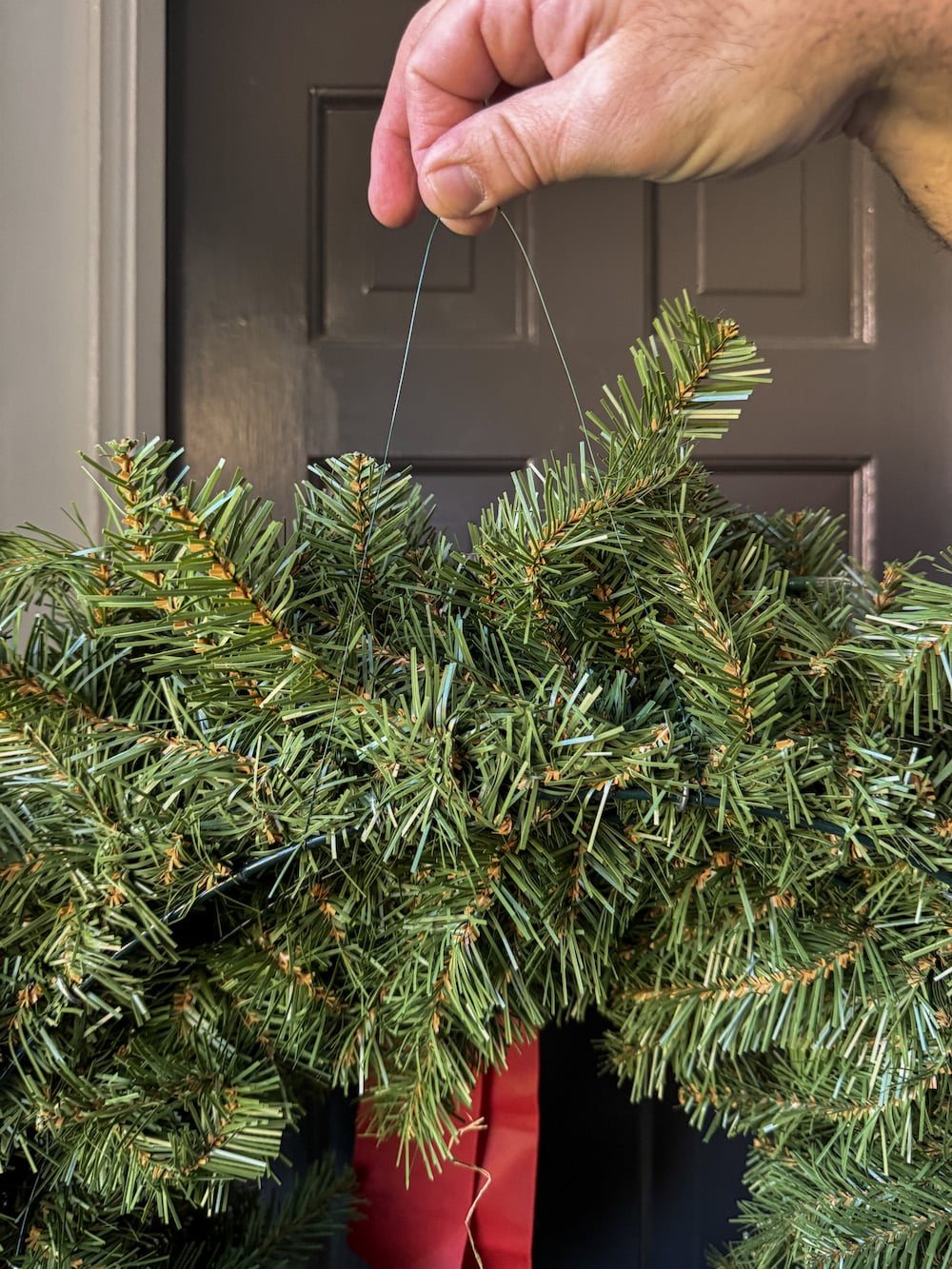 how to hang outdoor Christmas wreaths on windows without a ladder