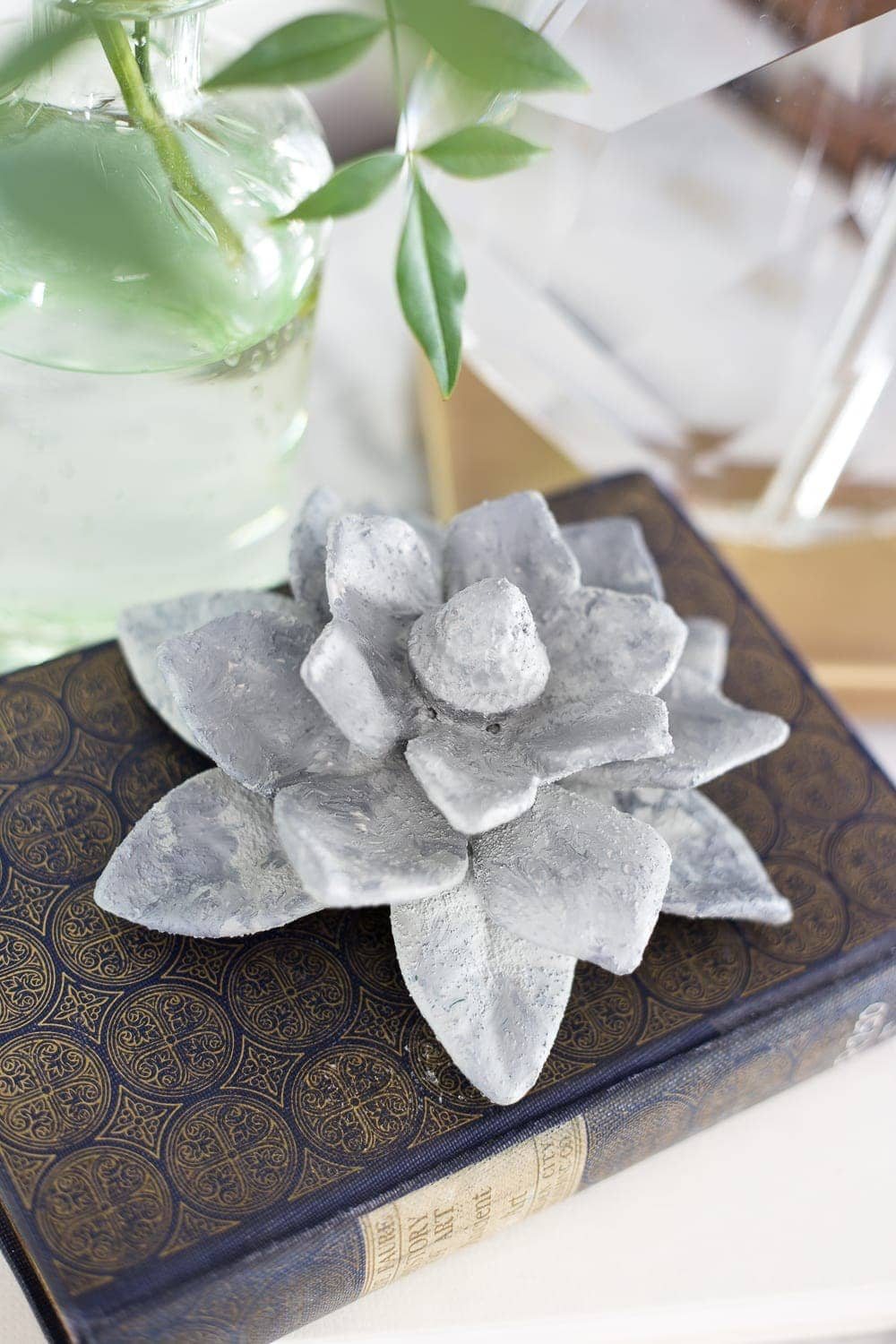 A quick and simple tutorial for how to make anything look like concrete with craft paint. #crafting #painting #thriftydecor