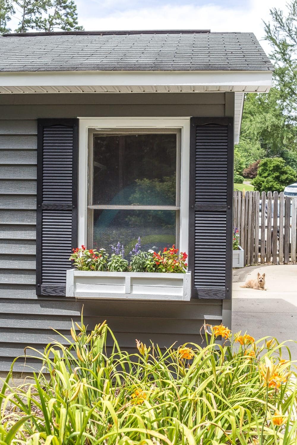 How to paint vinyl siding & DIY window box from scrap wood | Sherwin Williams Pepper Shake charcoal gray exterior