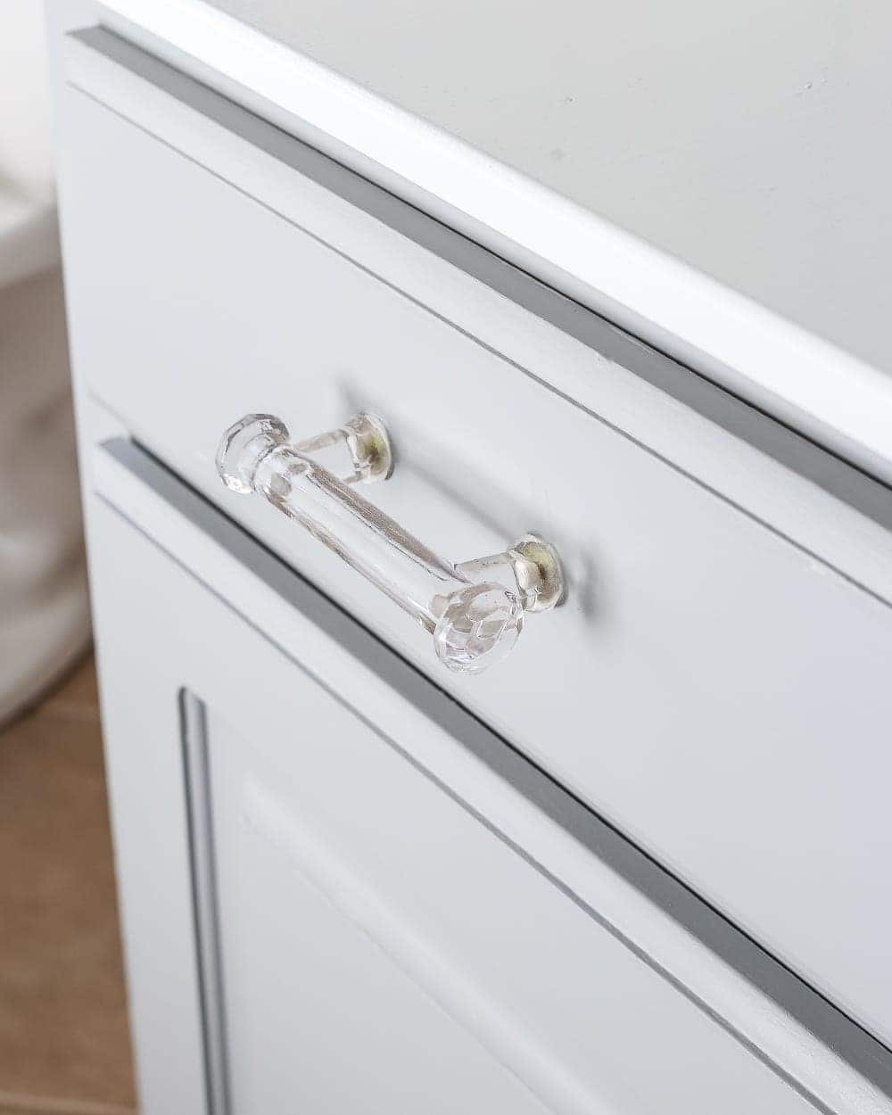 Painted Cabinet Bathroom Update | unigumushane.com - A dated cabinet gets a refresh with Benjamin Moore Coventry Gray for an inexpensive bathroom update. #cabinetpainting #homeimprovement #bathroom