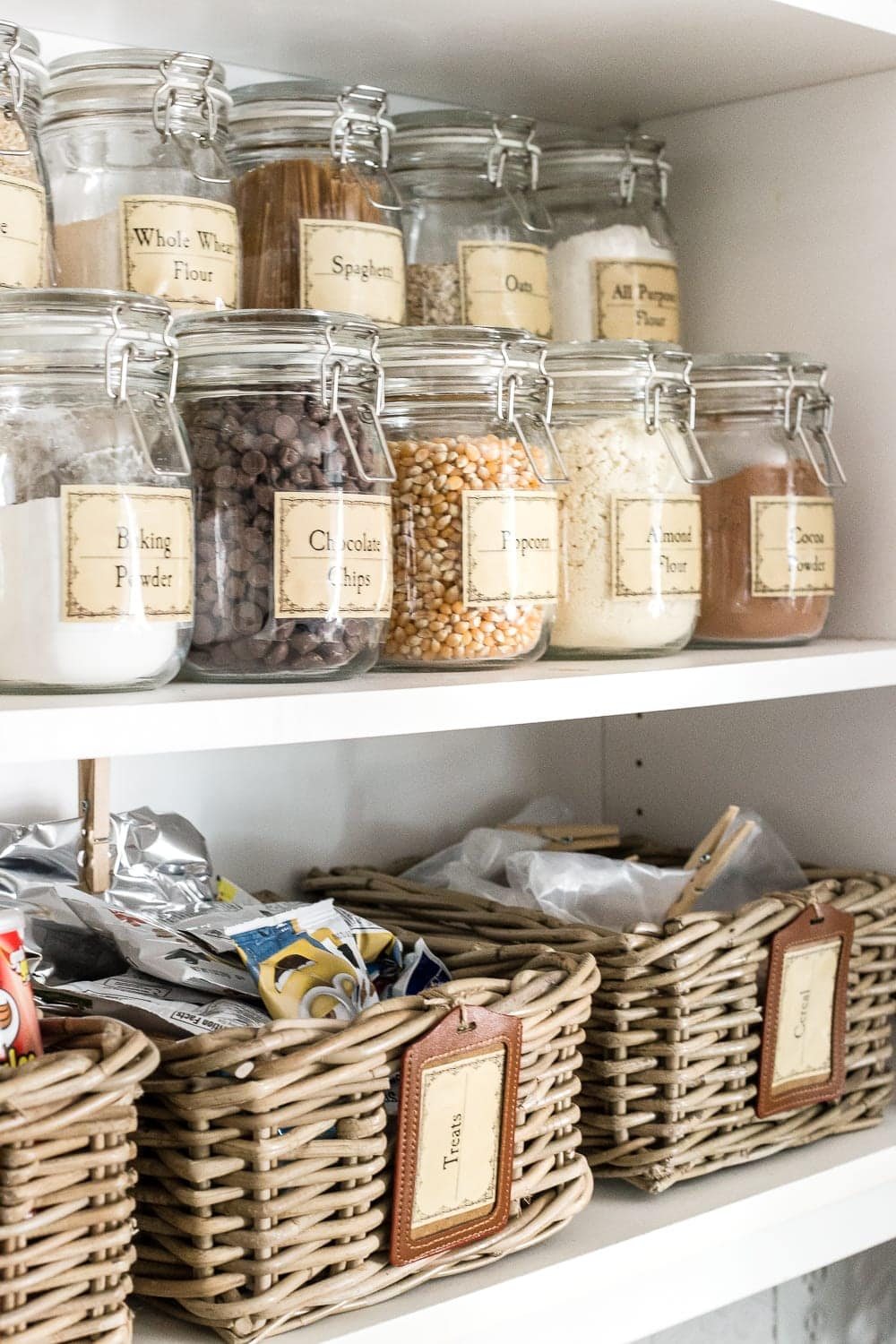 Pantry Cabinet Organization and Free Printable Label Set | unigumushane.com - A cabinet gets a drastic organization makeover using inexpensive IKEA jars / baskets, hanging storage, and a free pantry label printable set. #organization