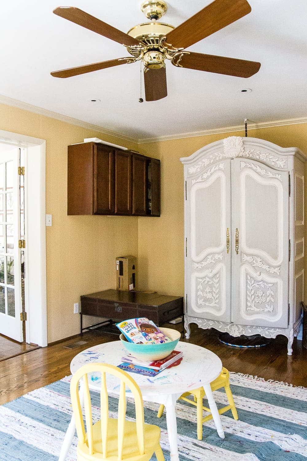 A dated, unorganized playroom gets a bright and whimsical makeover with organizational strategies, ideas for adding function, and DIY-able projects to create the perfect kid's space on a budget. #kidsroom #playroom #kidsdecor #toyorganizing