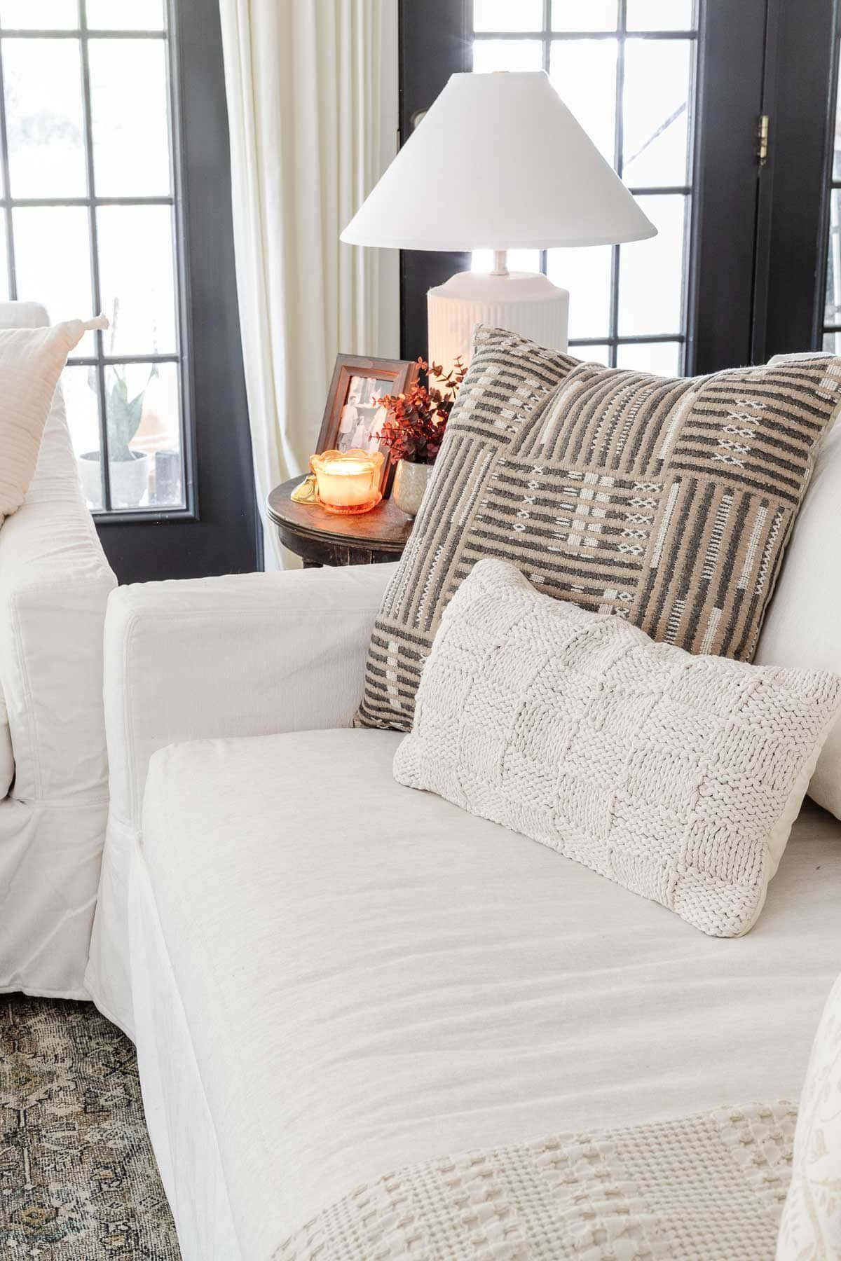 fall pillows on a living room sofa