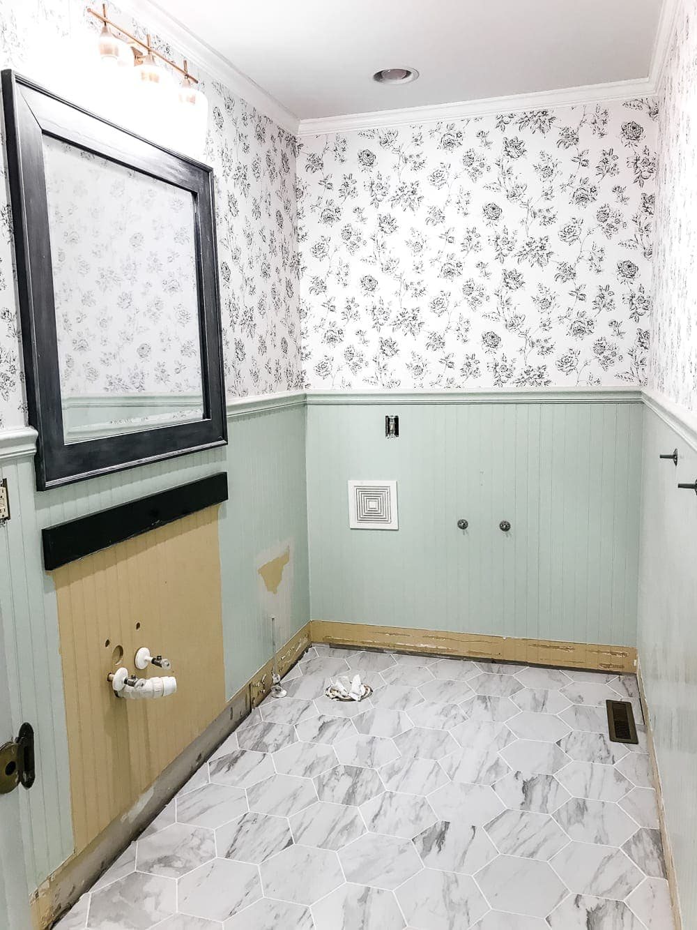 The Best Faux Marble Tile | unigumushane.com - A dated powder room floor gets a modern classic refresh with faux marble tile & why hiring a contractor is sometimes cheaper than DIY.