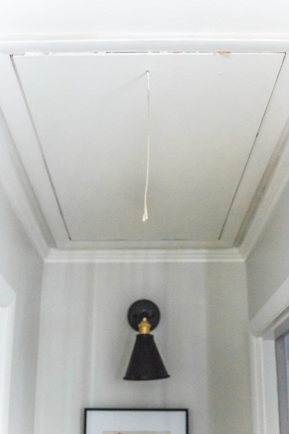 How to Replace an Attic Door String with a Hook | unigumushane.com - A quick tip for improving the look of a hanging cord on an attic door.