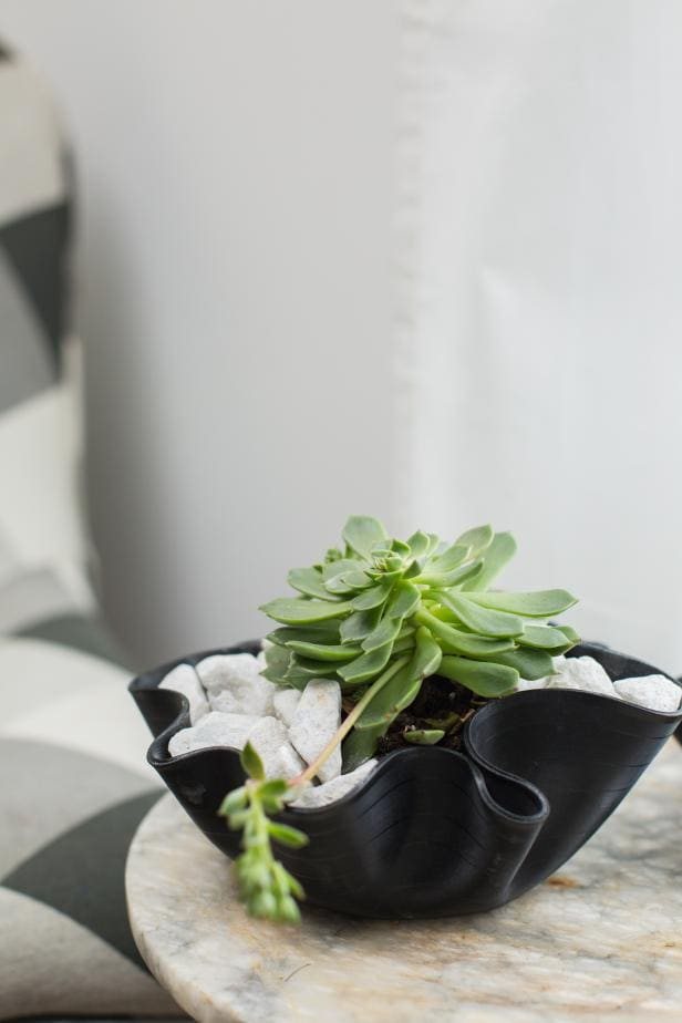 DIY ruffled bowl with scalloped rim made of a vinyl record
