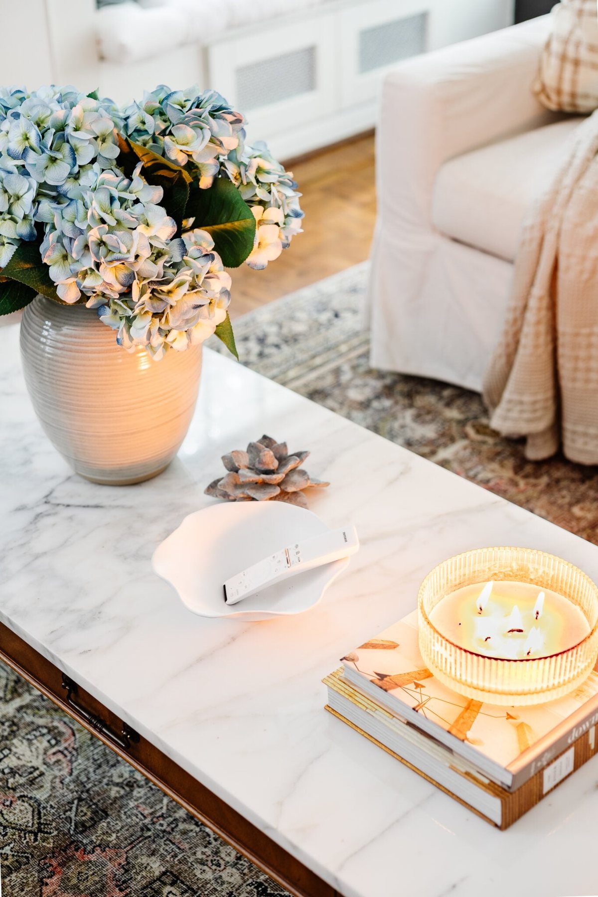 decorative bowl on a coffee table for holding TV remote