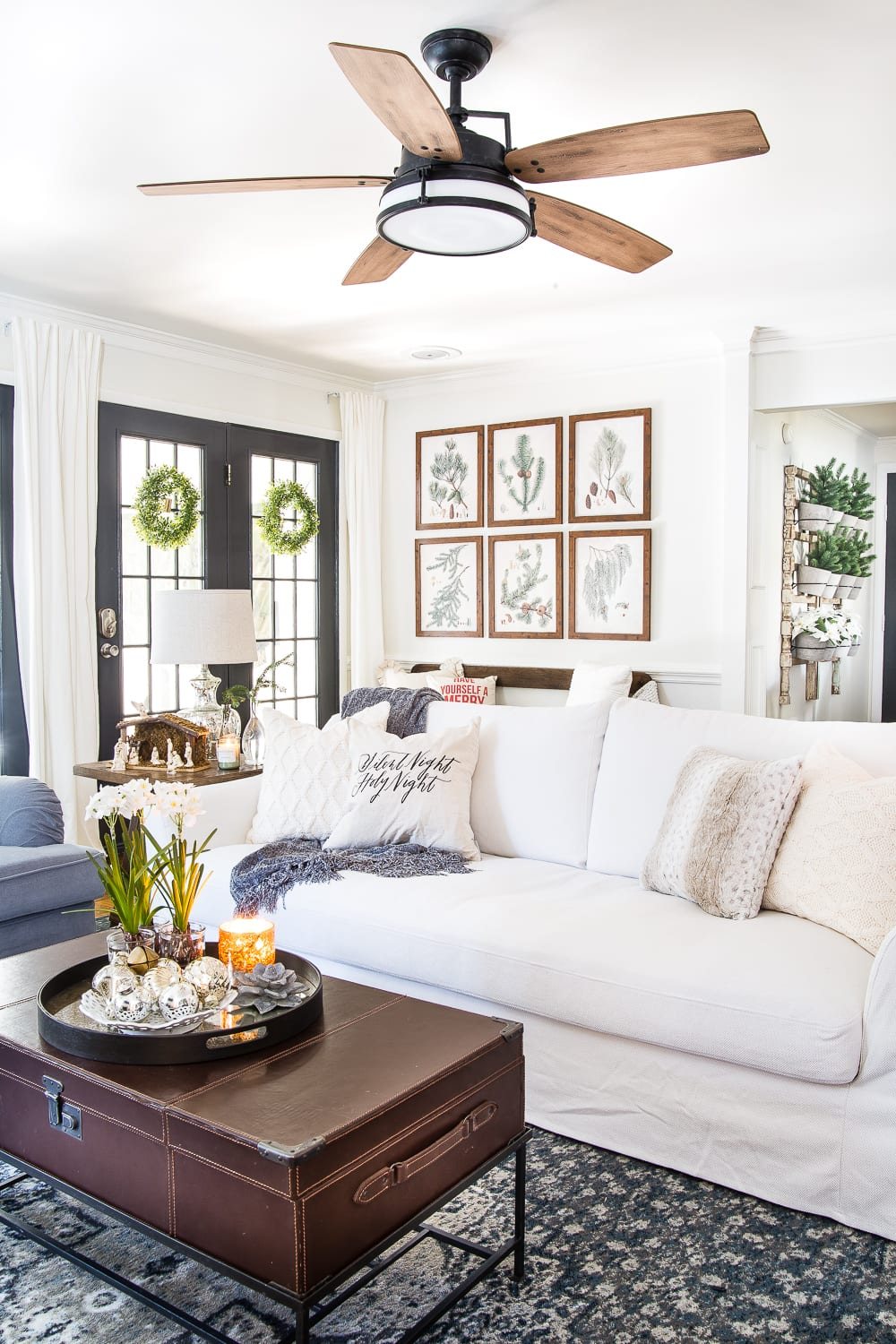Seasonal Simplicity Christmas Living Room | unigumushane.com - A tour of a neutral Christmas living room with simple, natural decor, mercury glass, and a modern rustic vibe. #christmaslivingroom #neutralchristmas #christmasdecor