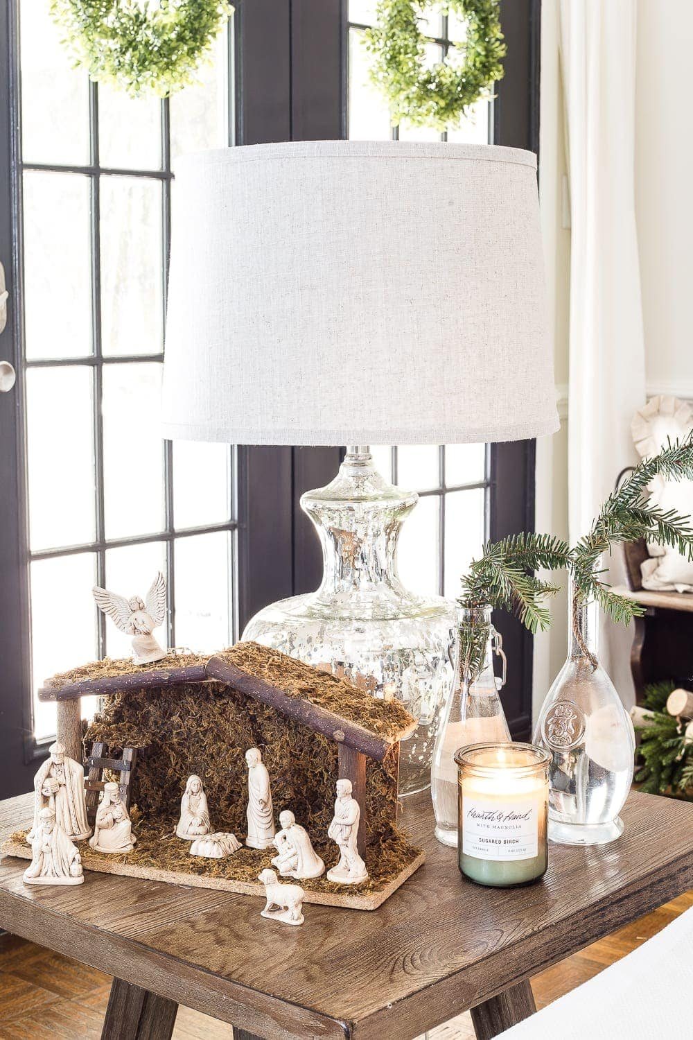 Seasonal Simplicity Christmas Living Room | unigumushane.com - A tour of a neutral Christmas living room with simple, natural decor, mercury glass, and a modern rustic vibe. #christmaslivingroom #neutralchristmas #christmasdecor