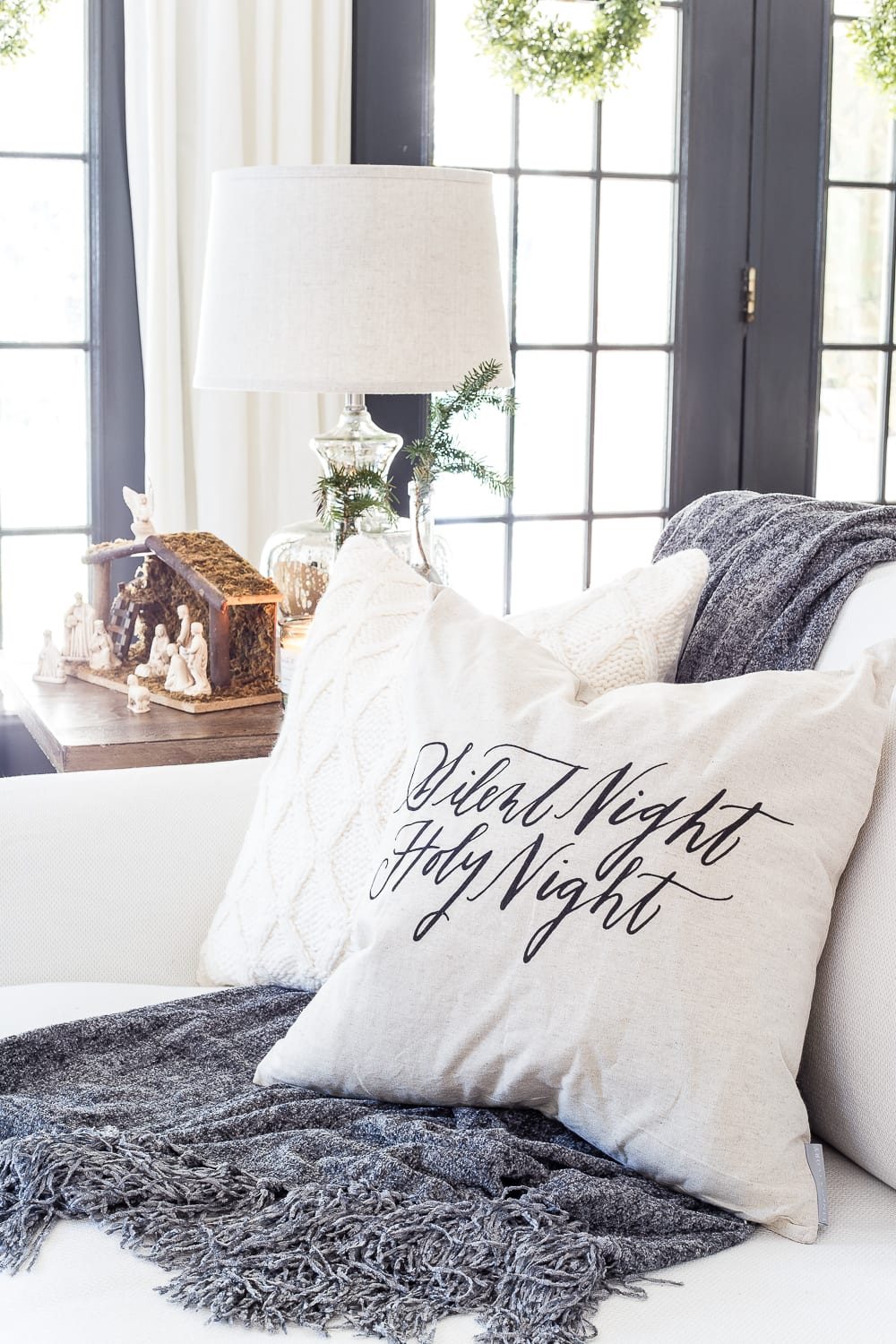 Seasonal Simplicity Christmas Living Room | unigumushane.com - A tour of a neutral Christmas living room with simple, natural decor, mercury glass, and a modern rustic vibe. #christmaslivingroom #neutralchristmas #christmasdecor