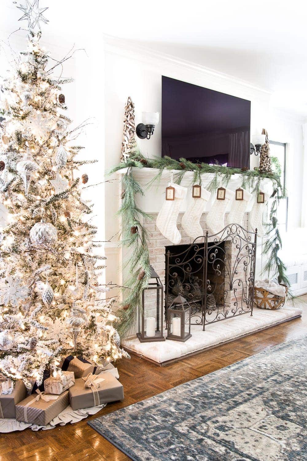 Seasonal Simplicity Christmas Living Room | unigumushane.com - A tour of a neutral Christmas living room with simple, natural decor, mercury glass, and a modern rustic vibe. #christmaslivingroom #neutralchristmas #christmasdecor