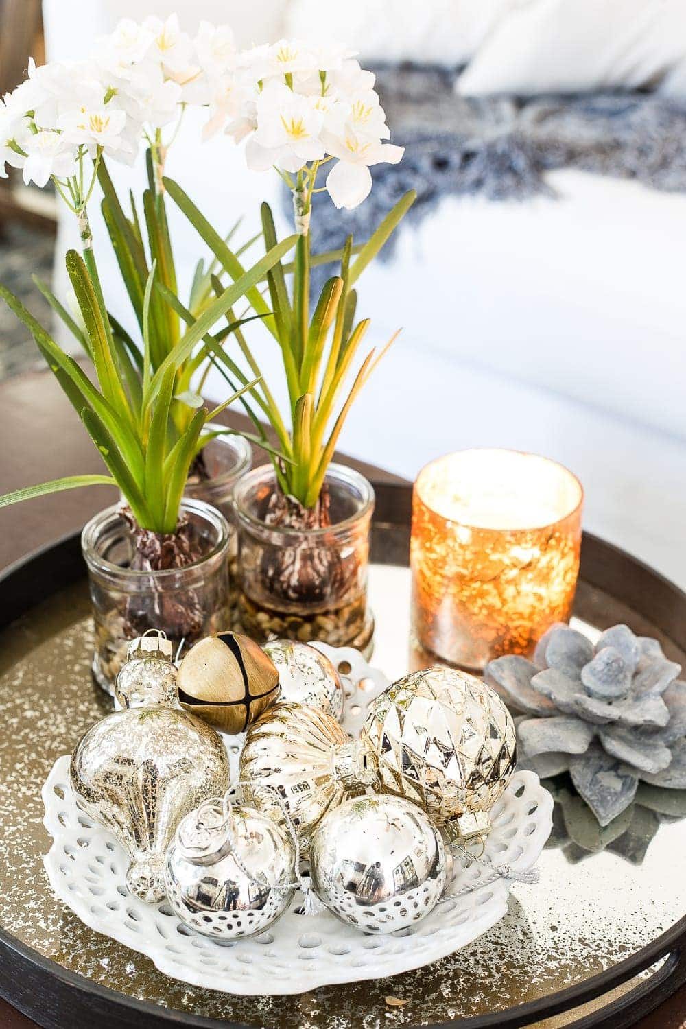 Seasonal Simplicity Christmas Living Room | unigumushane.com - A tour of a neutral Christmas living room with simple, natural decor, mercury glass, and a modern rustic vibe. #christmaslivingroom #neutralchristmas #christmasdecor