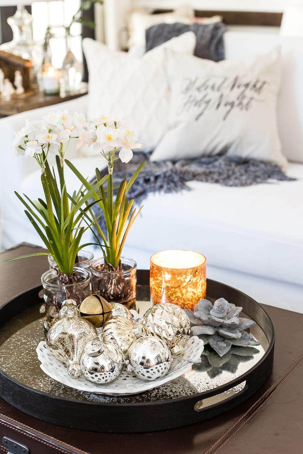Seasonal Simplicity Christmas Living Room | unigumushane.com - A tour of a neutral Christmas living room with simple, natural decor, mercury glass, and a modern rustic vibe. #christmaslivingroom #neutralchristmas #christmasdecor
