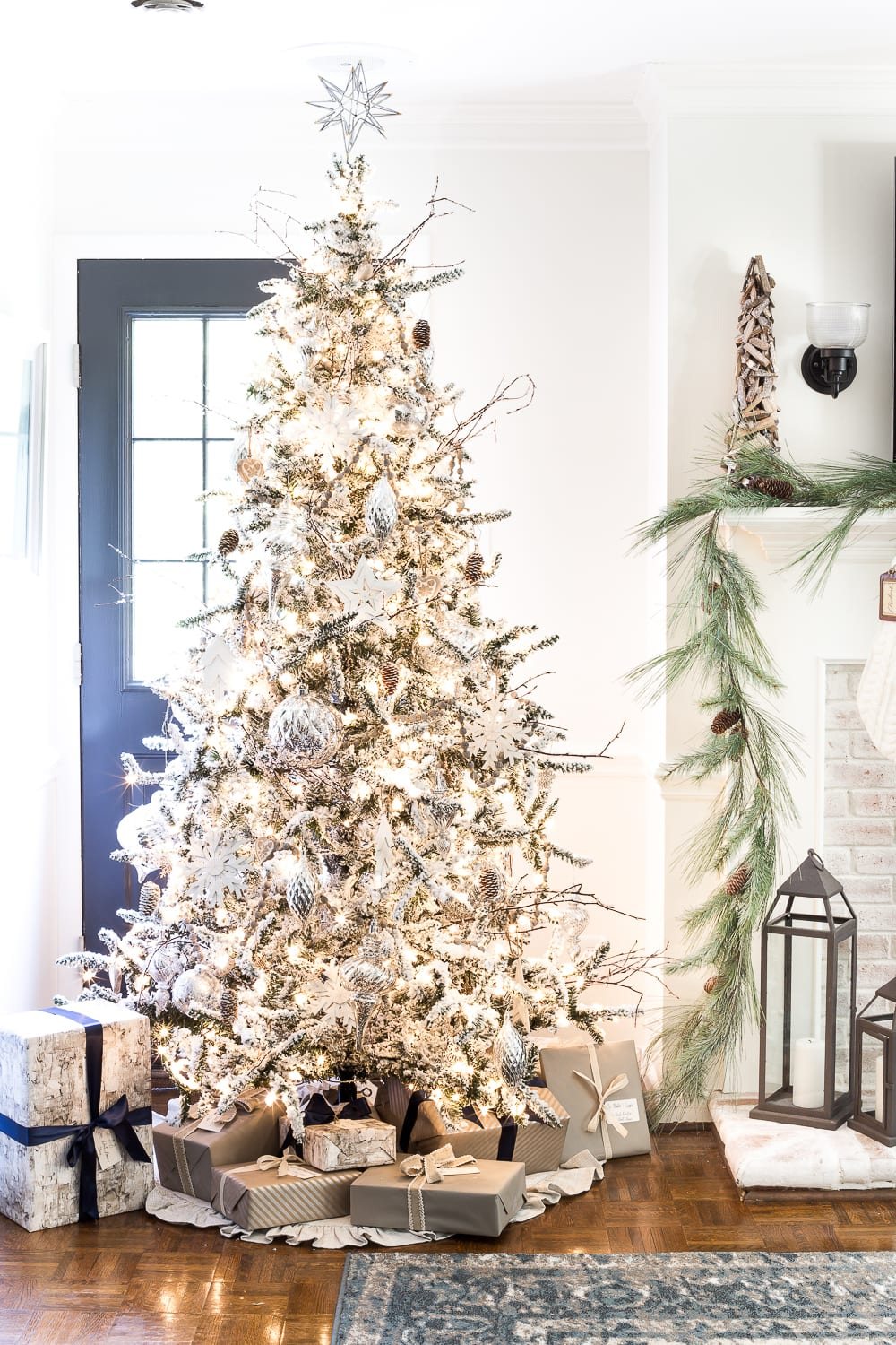 Seasonal Simplicity Christmas Living Room | unigumushane.com - A tour of a neutral Christmas living room with simple, natural decor, mercury glass, and a modern rustic vibe. #christmaslivingroom #neutralchristmas #christmasdecor