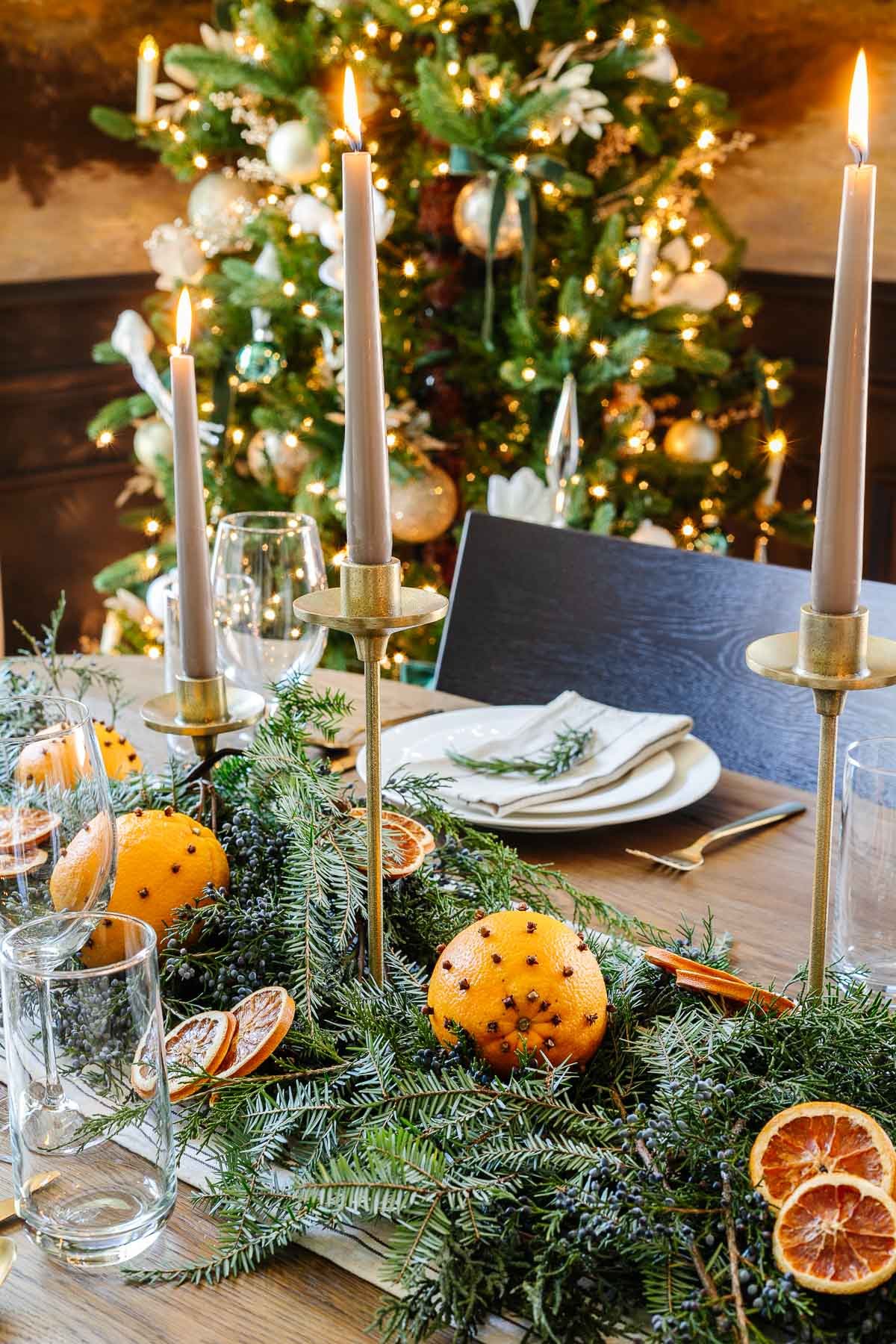 dried orange and evergreen Christmas table centerpiece